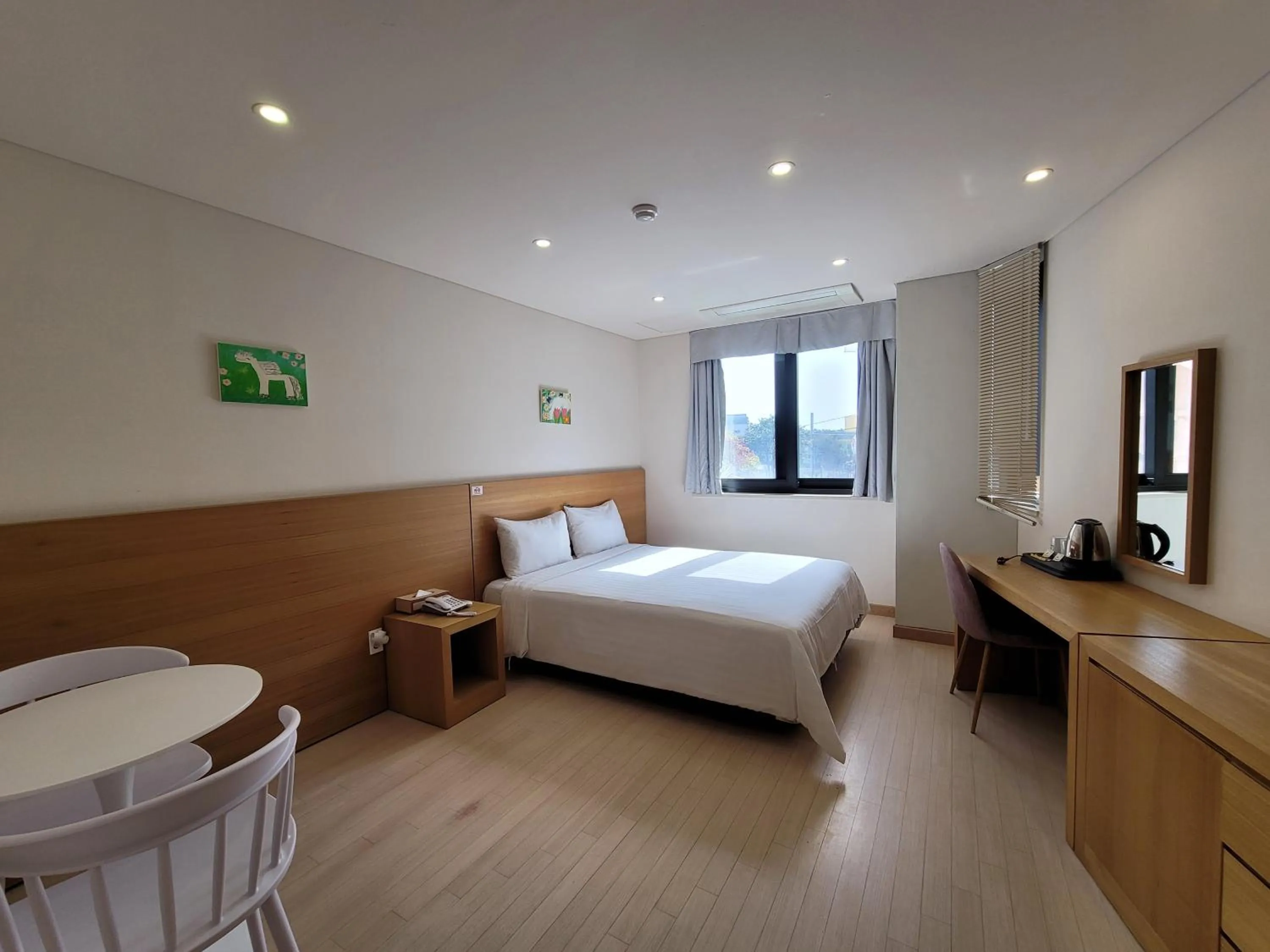 Photo of the whole room, Bed in BK Hotel Jeju