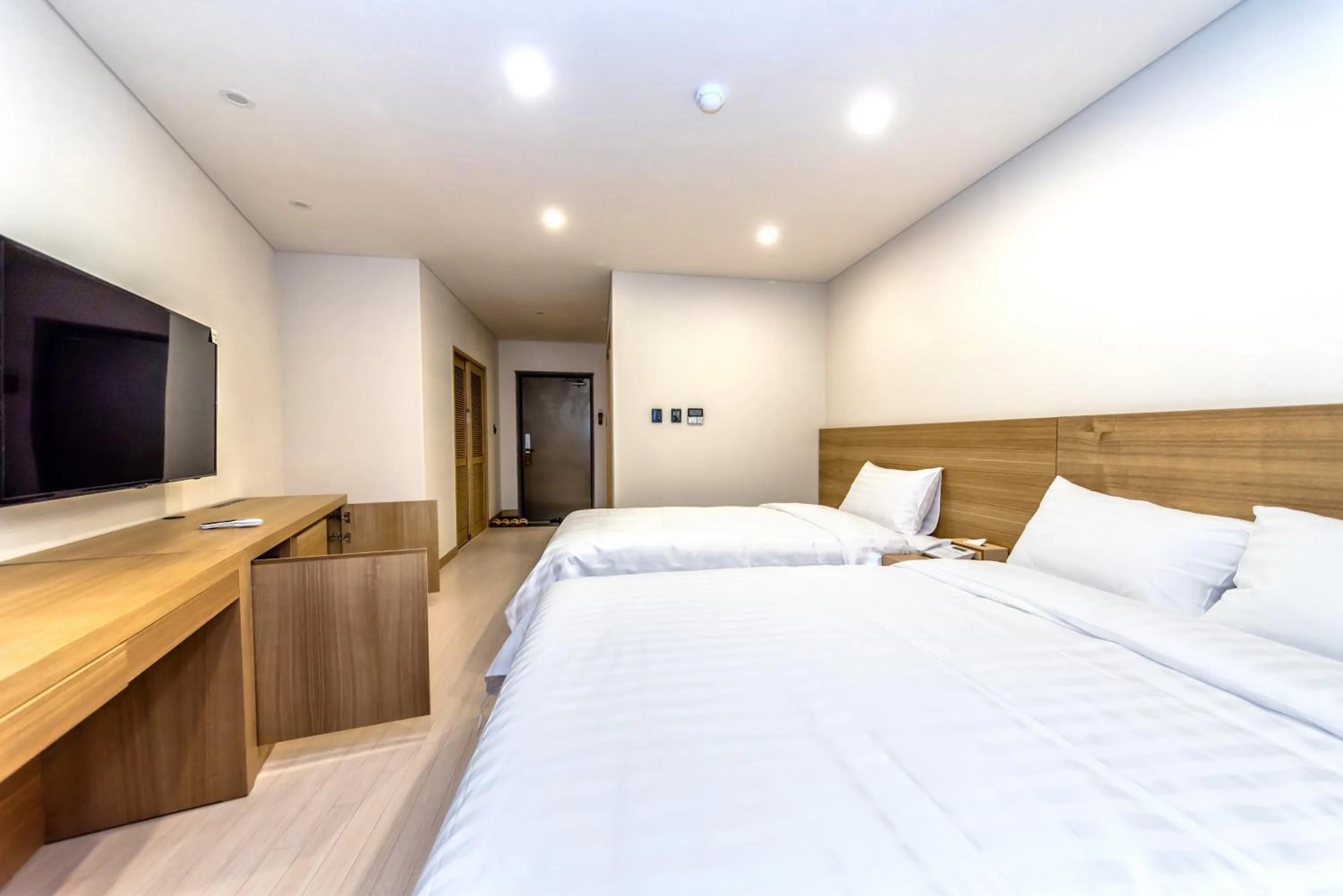 Bed in BK Hotel Jeju