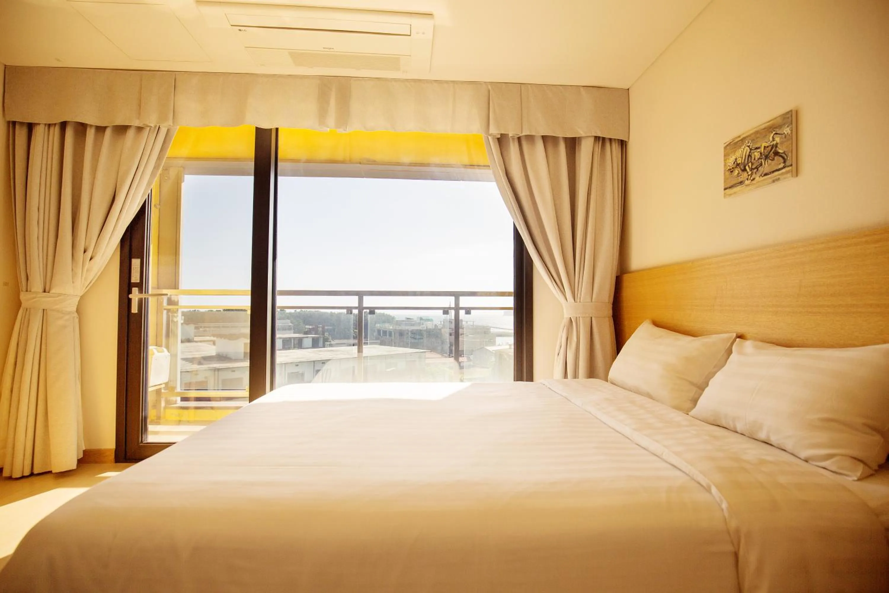 Bed in BK Hotel Jeju