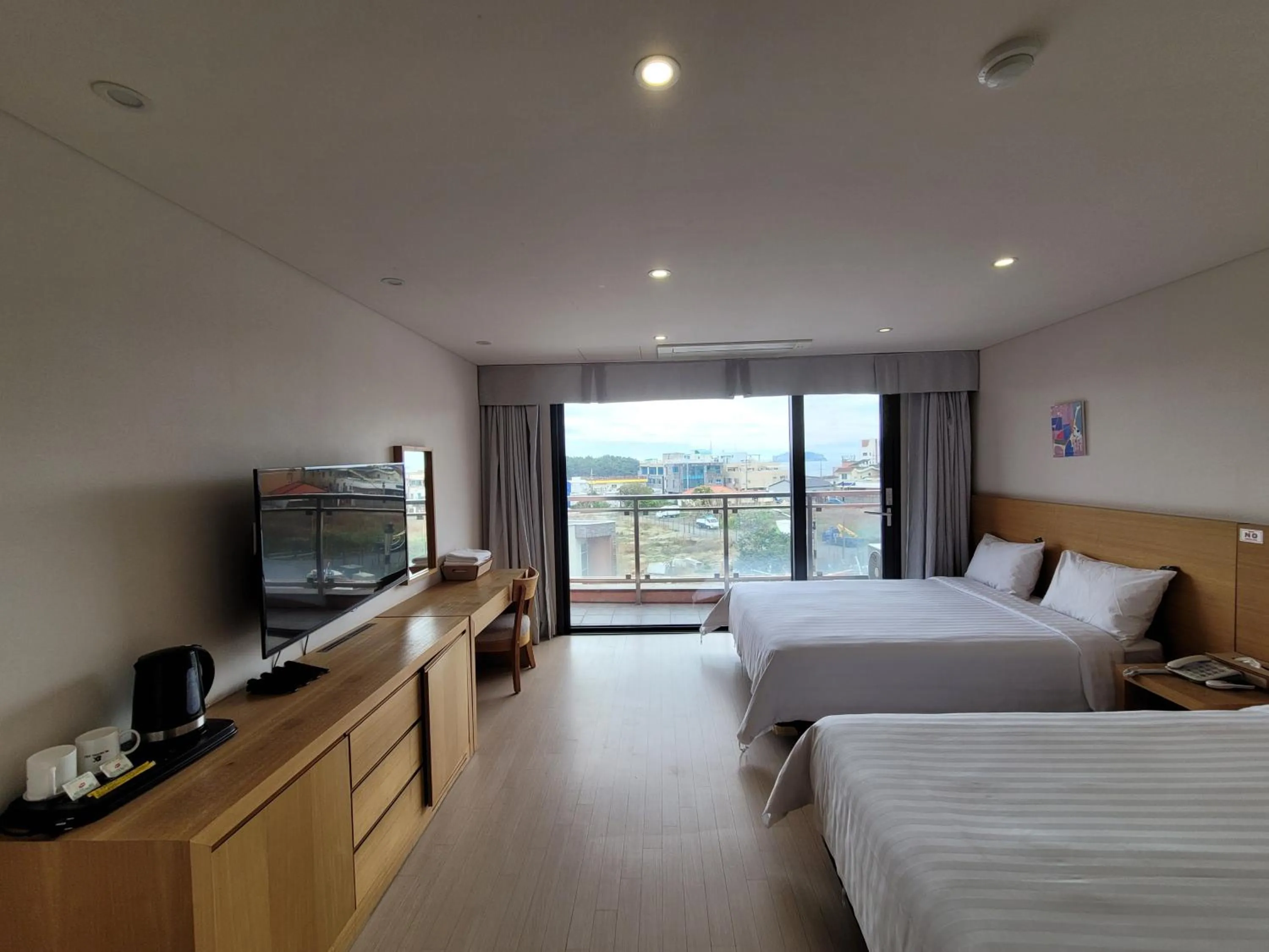Photo of the whole room, Bed in BK Hotel Jeju