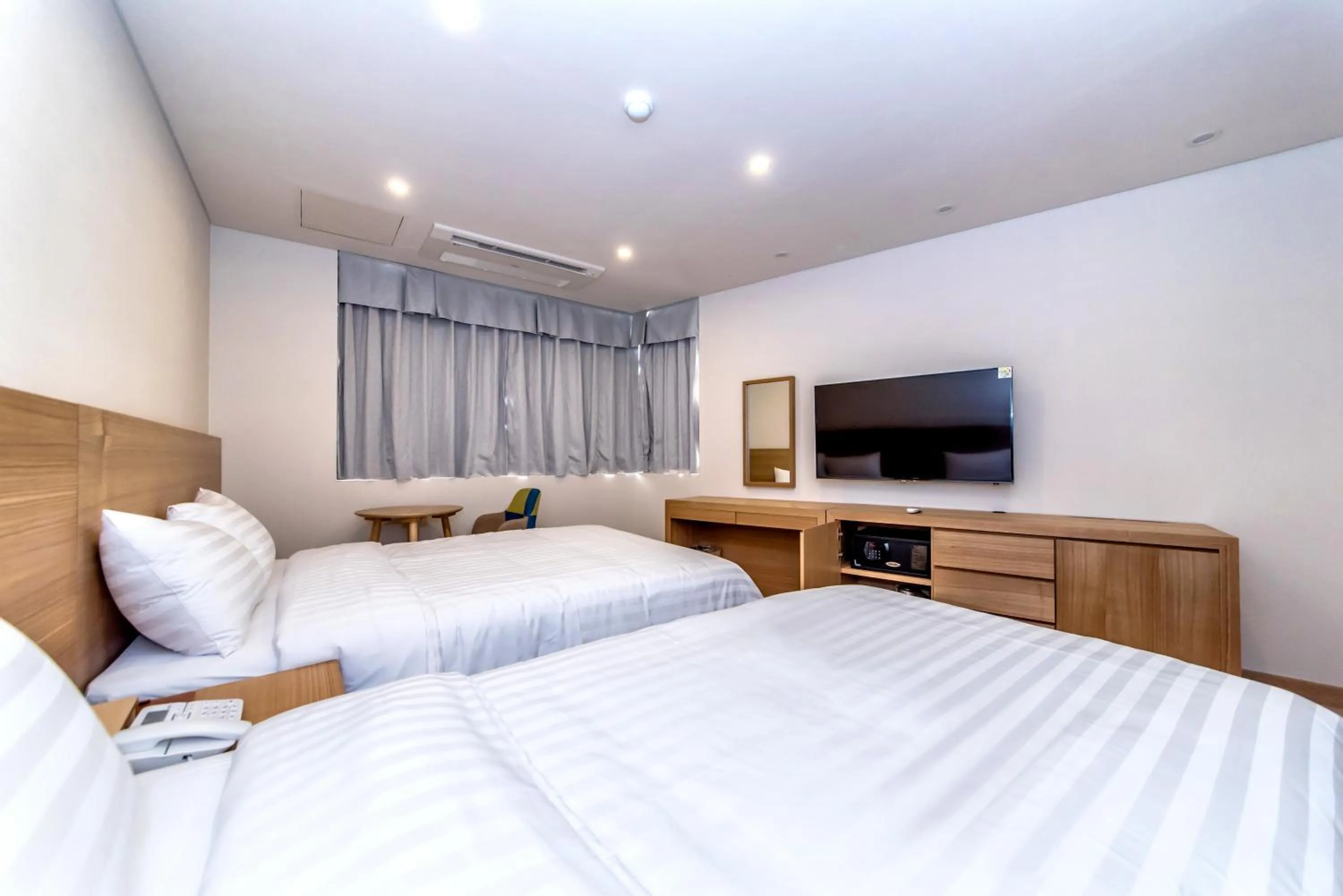 Bed in BK Hotel Jeju