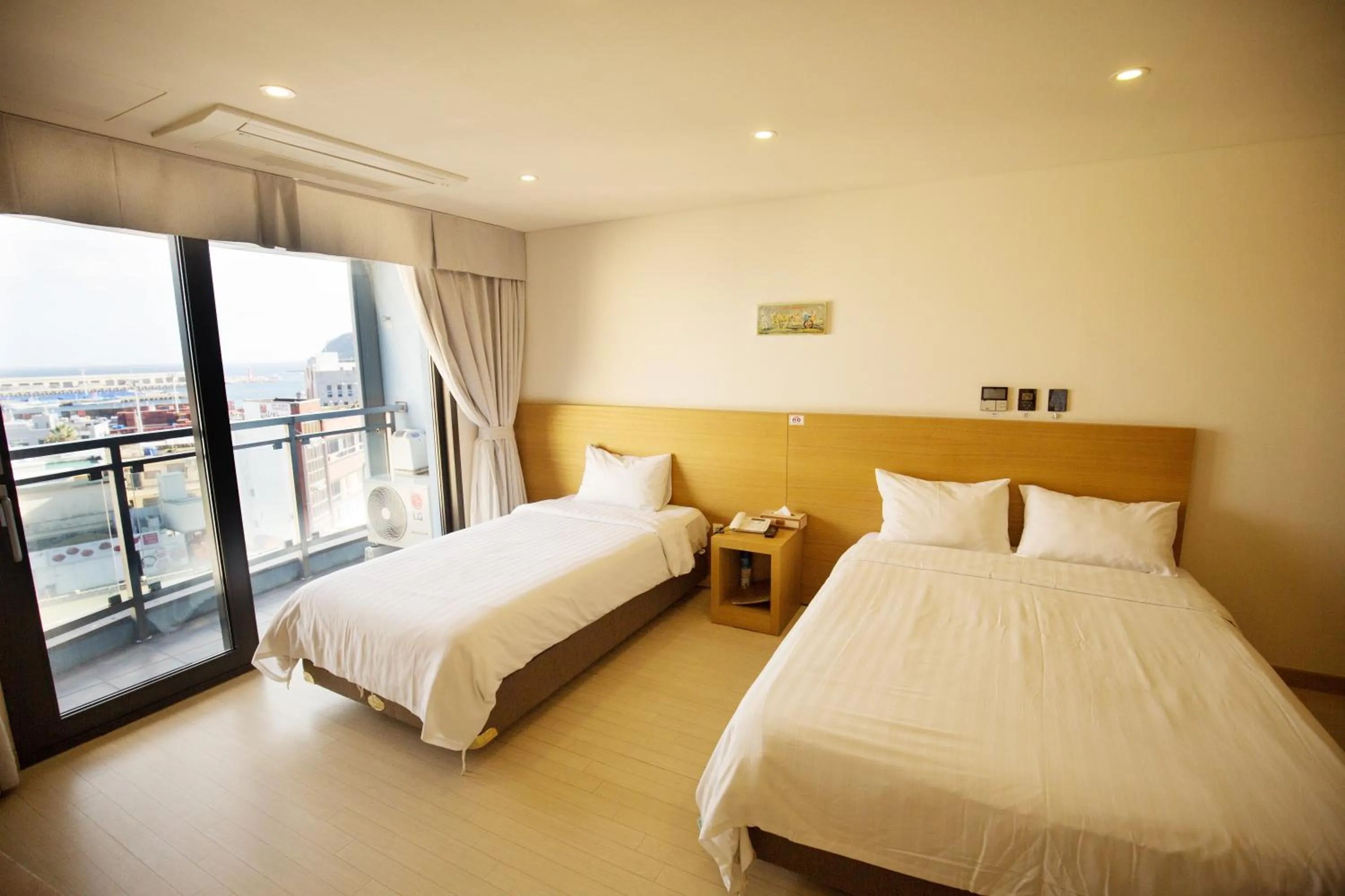 Bed in BK Hotel Jeju