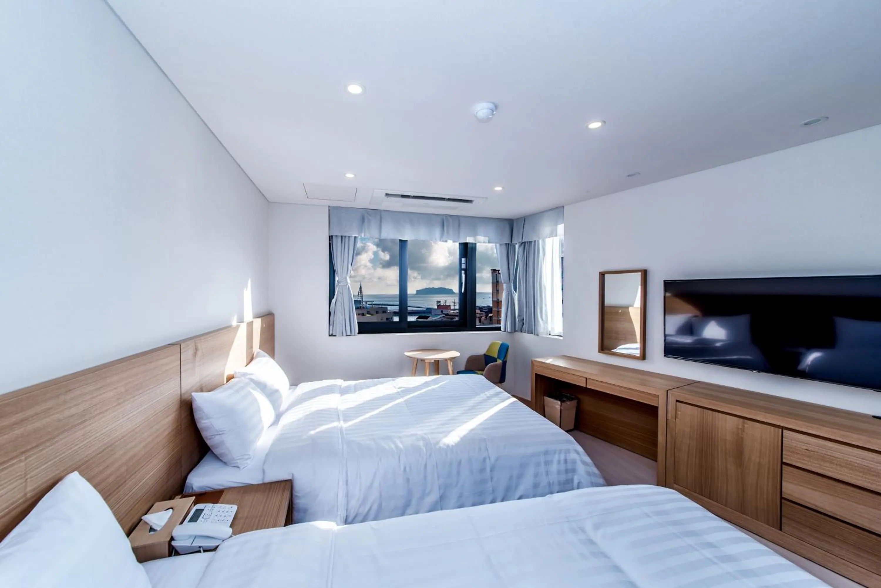 Photo of the whole room, Bed in BK Hotel Jeju