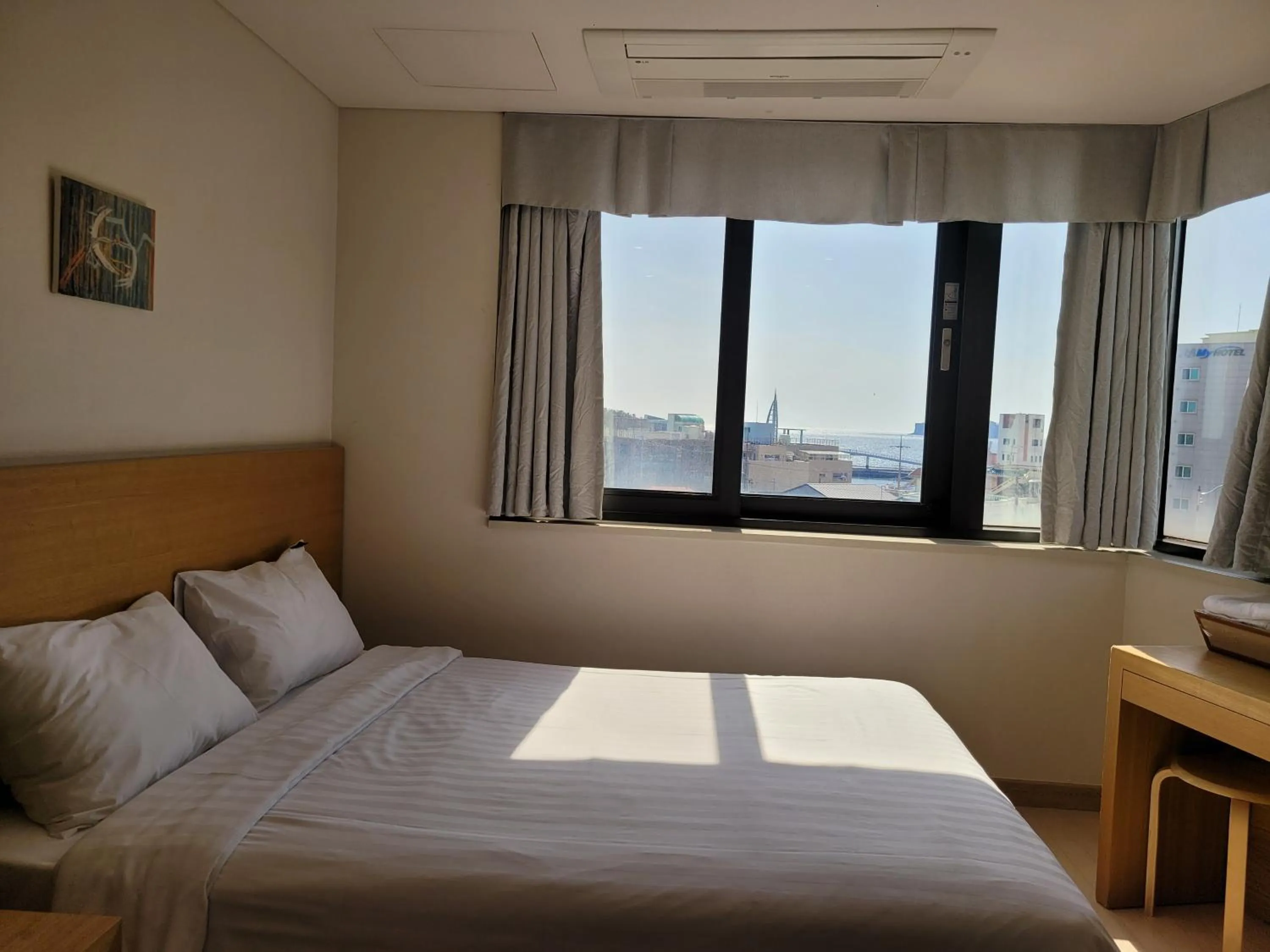 Bed in BK Hotel Jeju