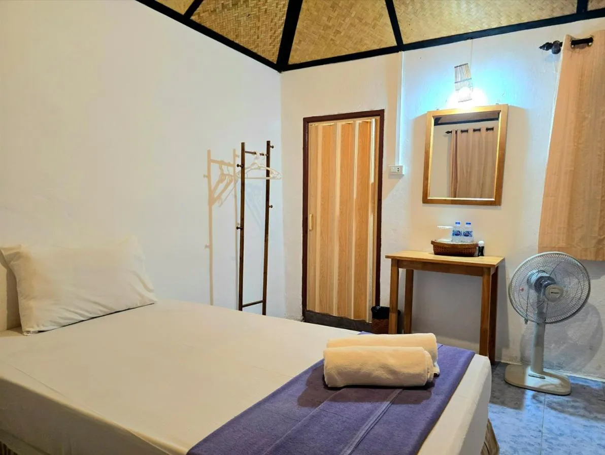 Bed in Kradan Beach Resort