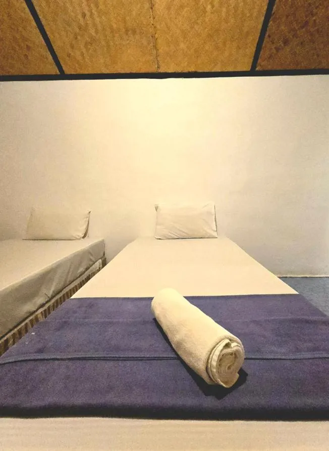 Bed in Kradan Beach Resort