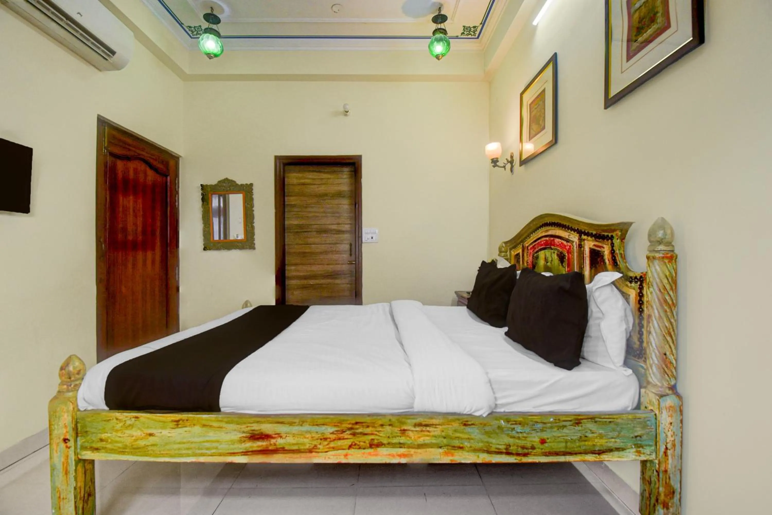 Bedroom, Bed in Collection O Jal Mahal Jaipur Formerly Little Ganesha Inn