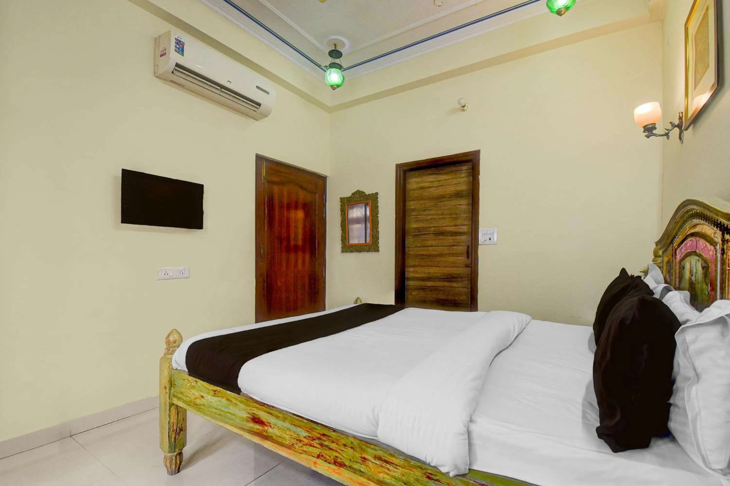 Bedroom, Bed in Collection O Jal Mahal Jaipur Formerly Little Ganesha Inn