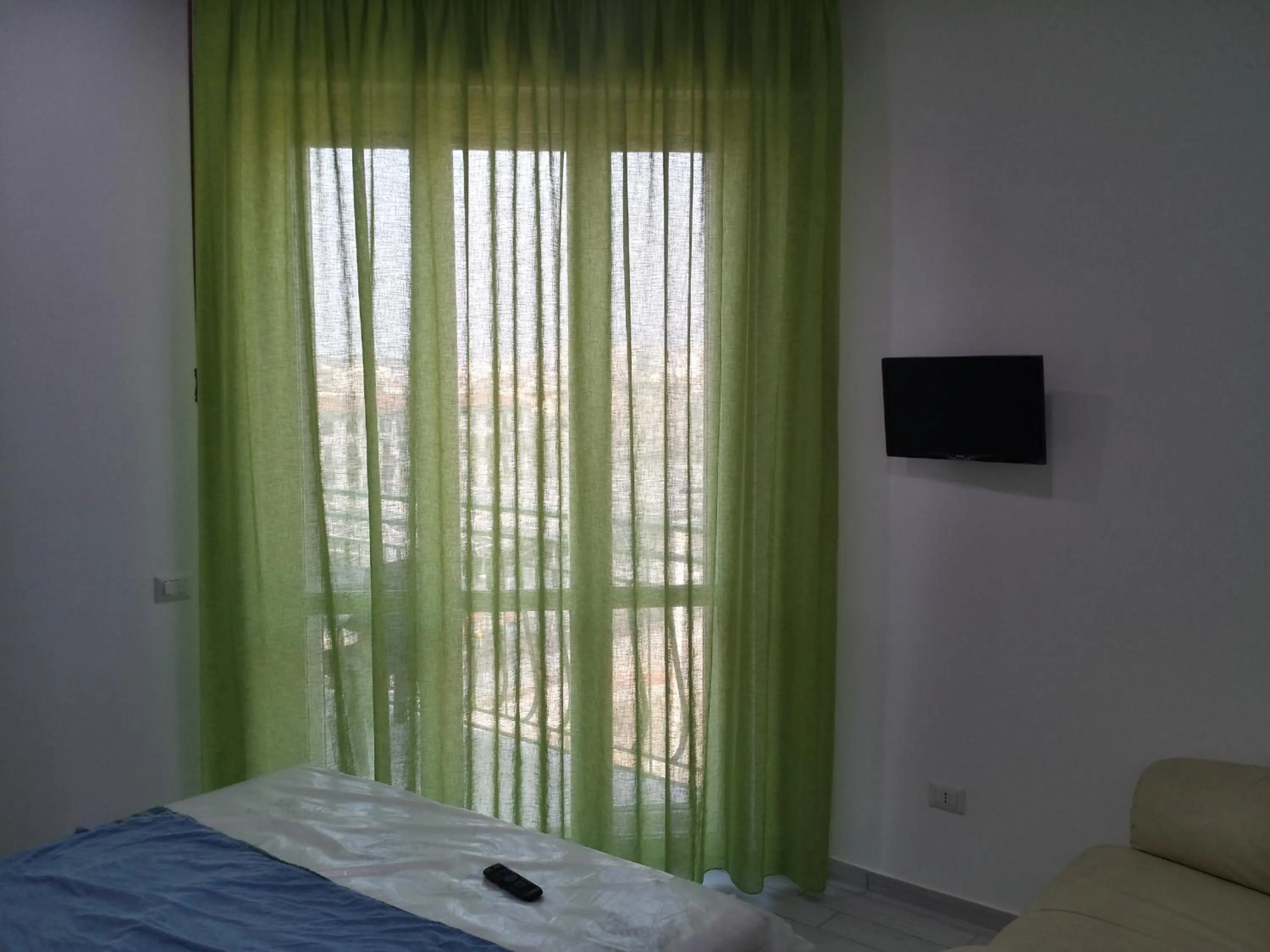 Day, Bed in Top Floor Rentrooms Napoli