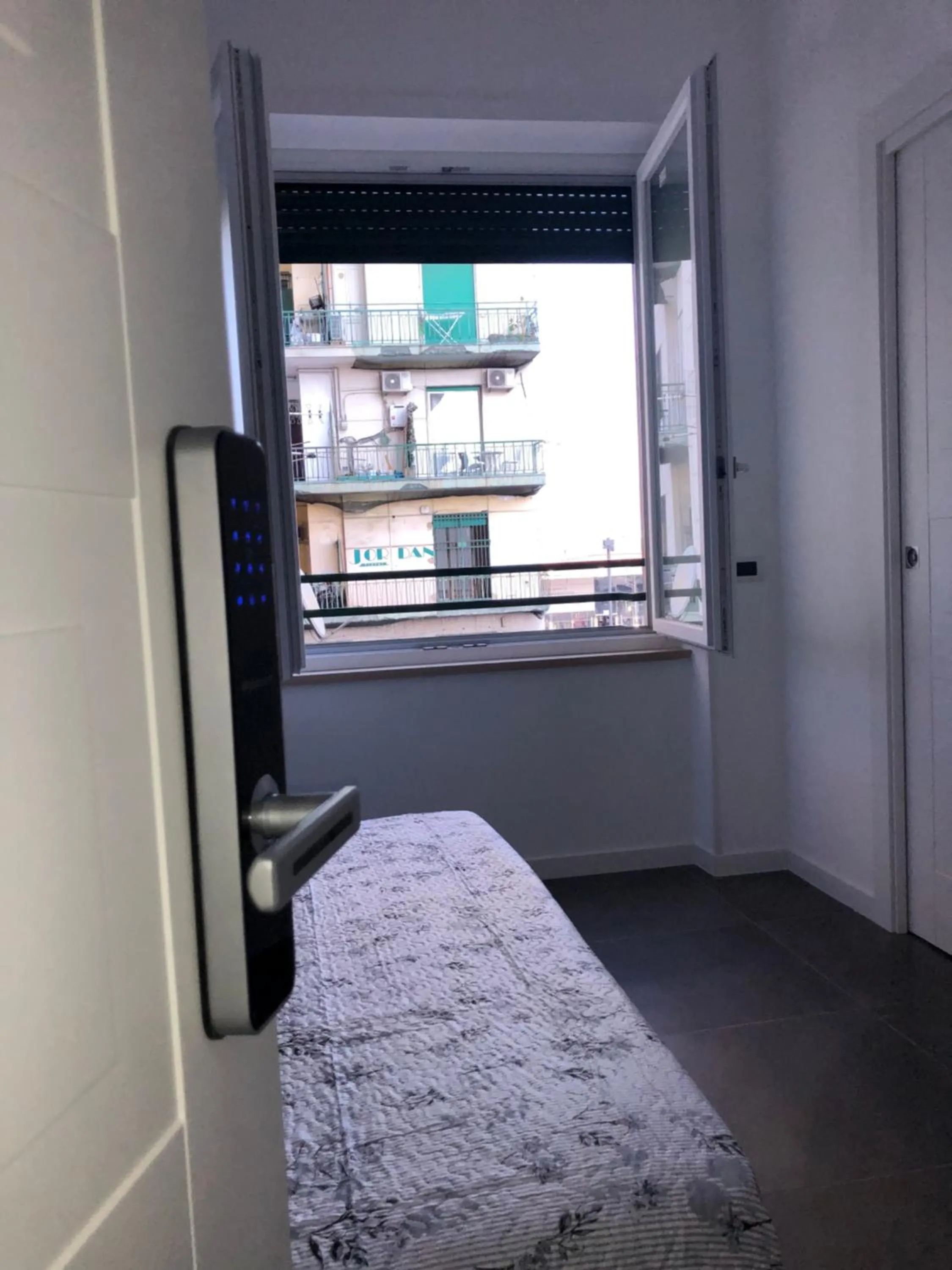 Photo of the whole room, Bed in Top Floor Rentrooms Napoli