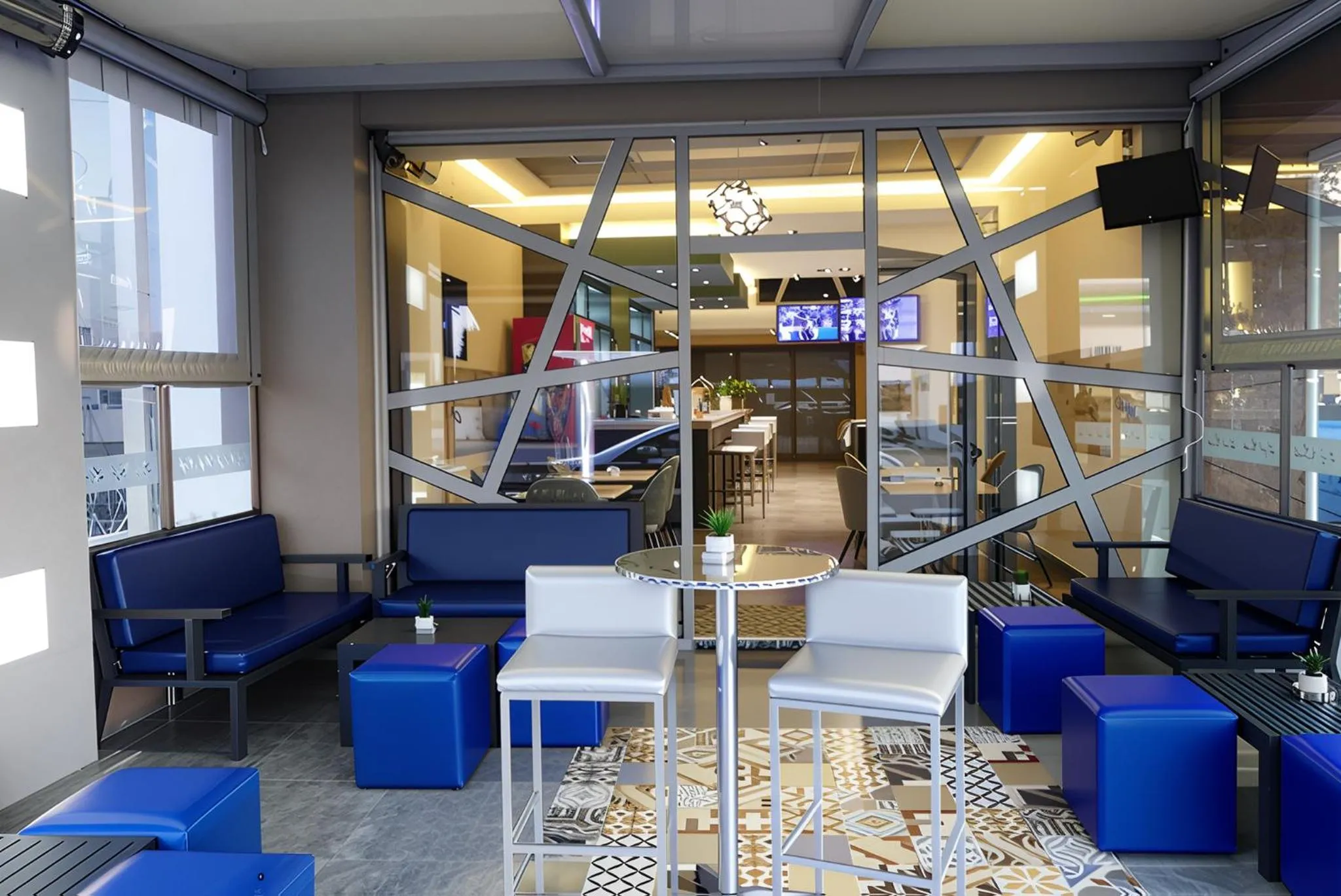 Communal lounge/ TV room in City Life Port Hotel