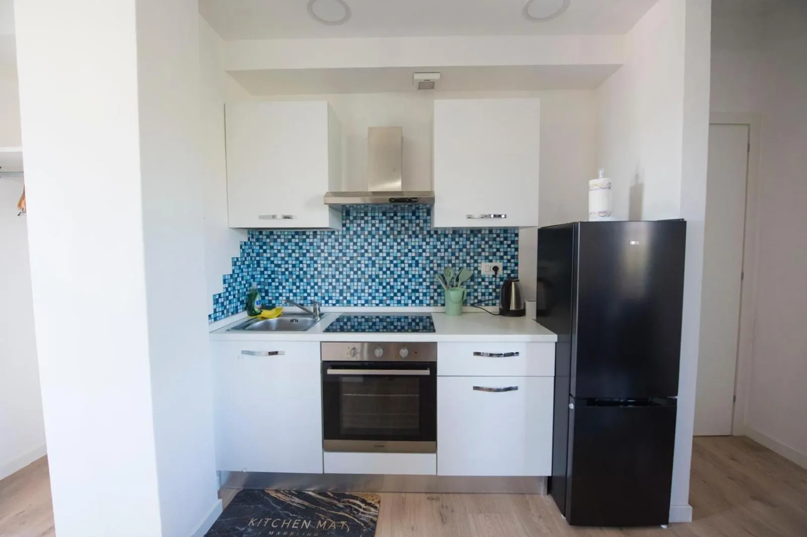 Kitchen or kitchenette in B&B Casa Cosmano