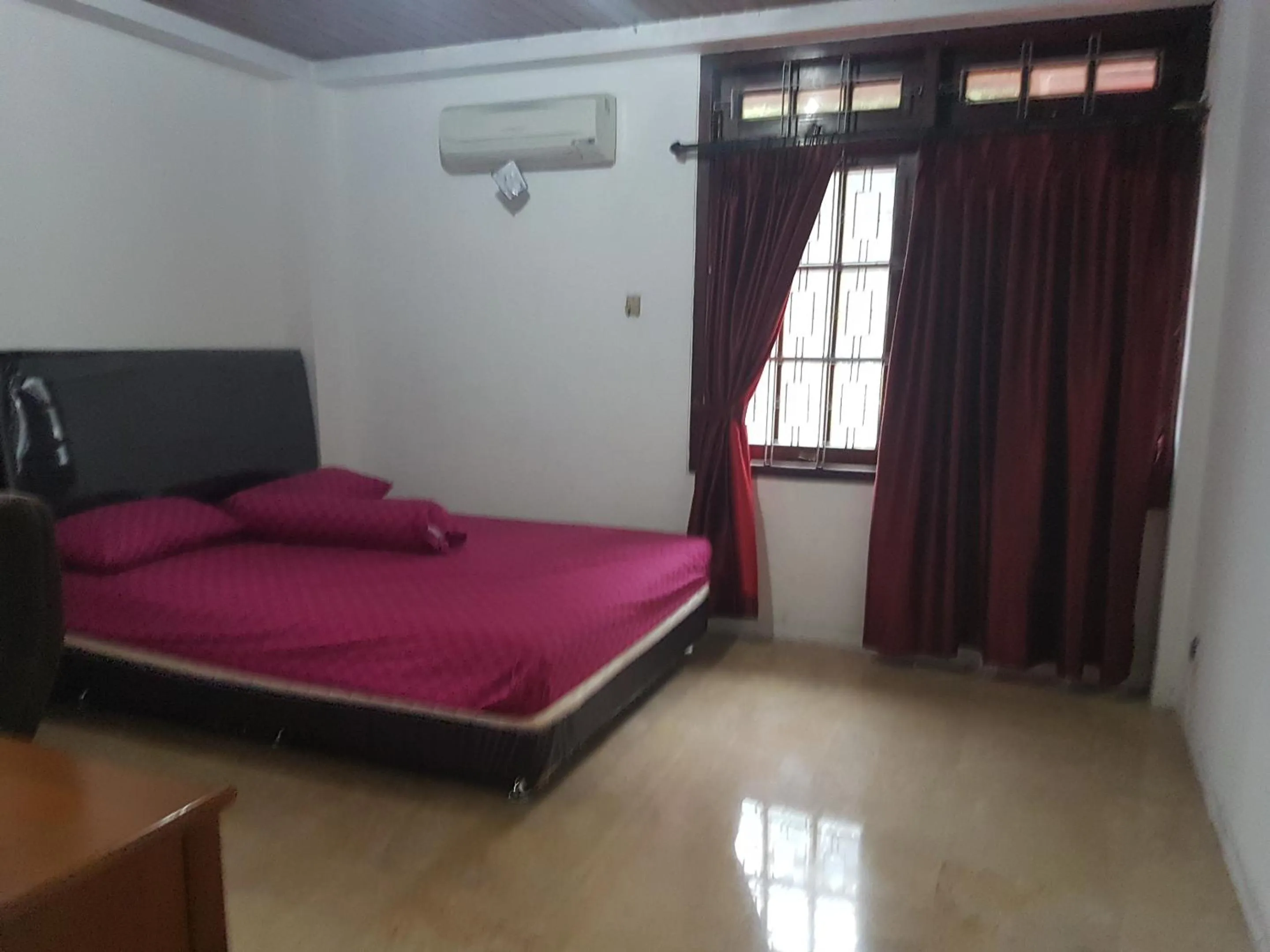 Bed in Mayestik Guest House Syariah