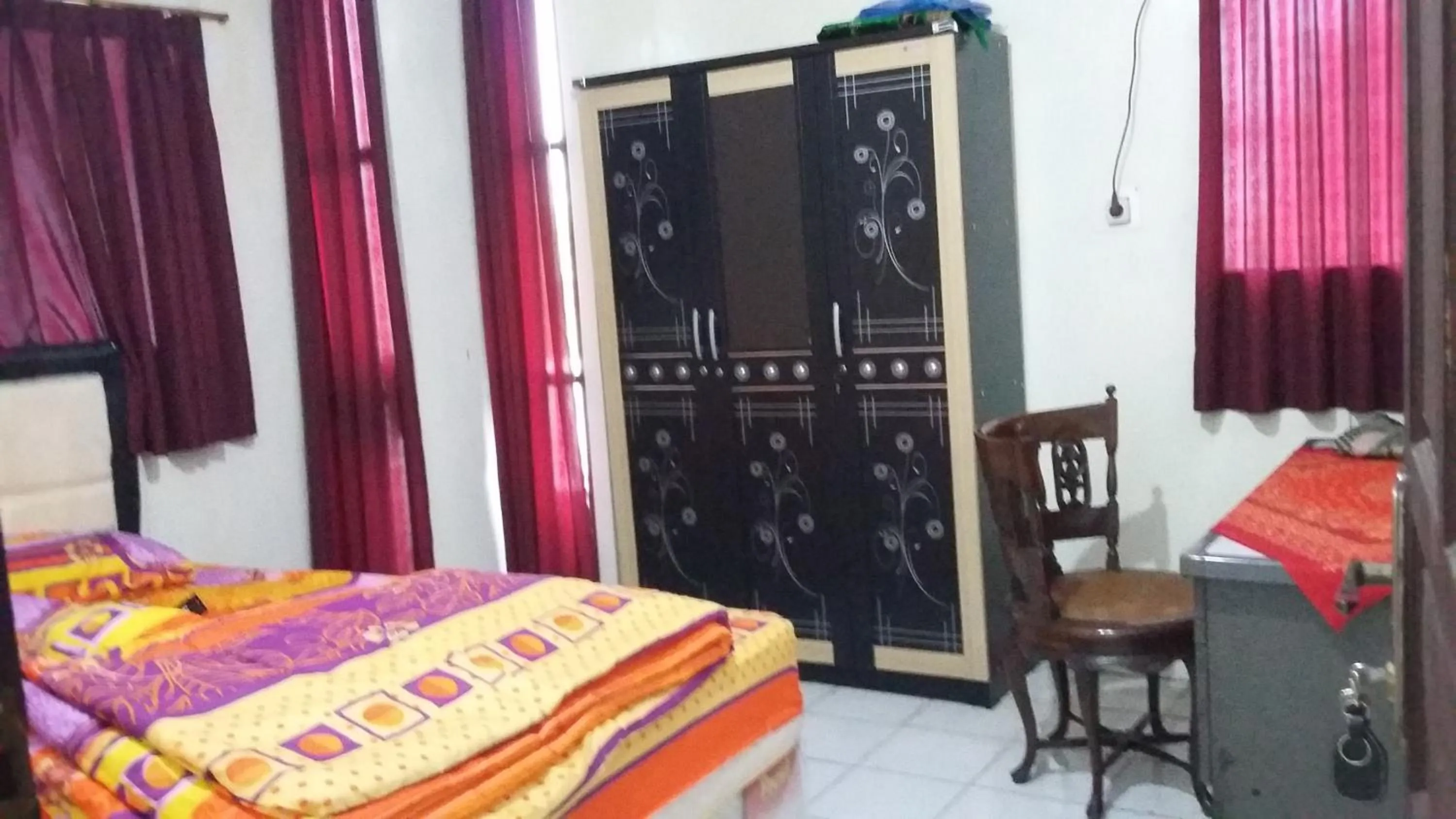 Bed in Mayestik Guest House Syariah