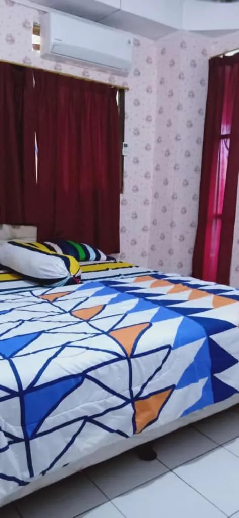 Bed in Mayestik Guest House Syariah