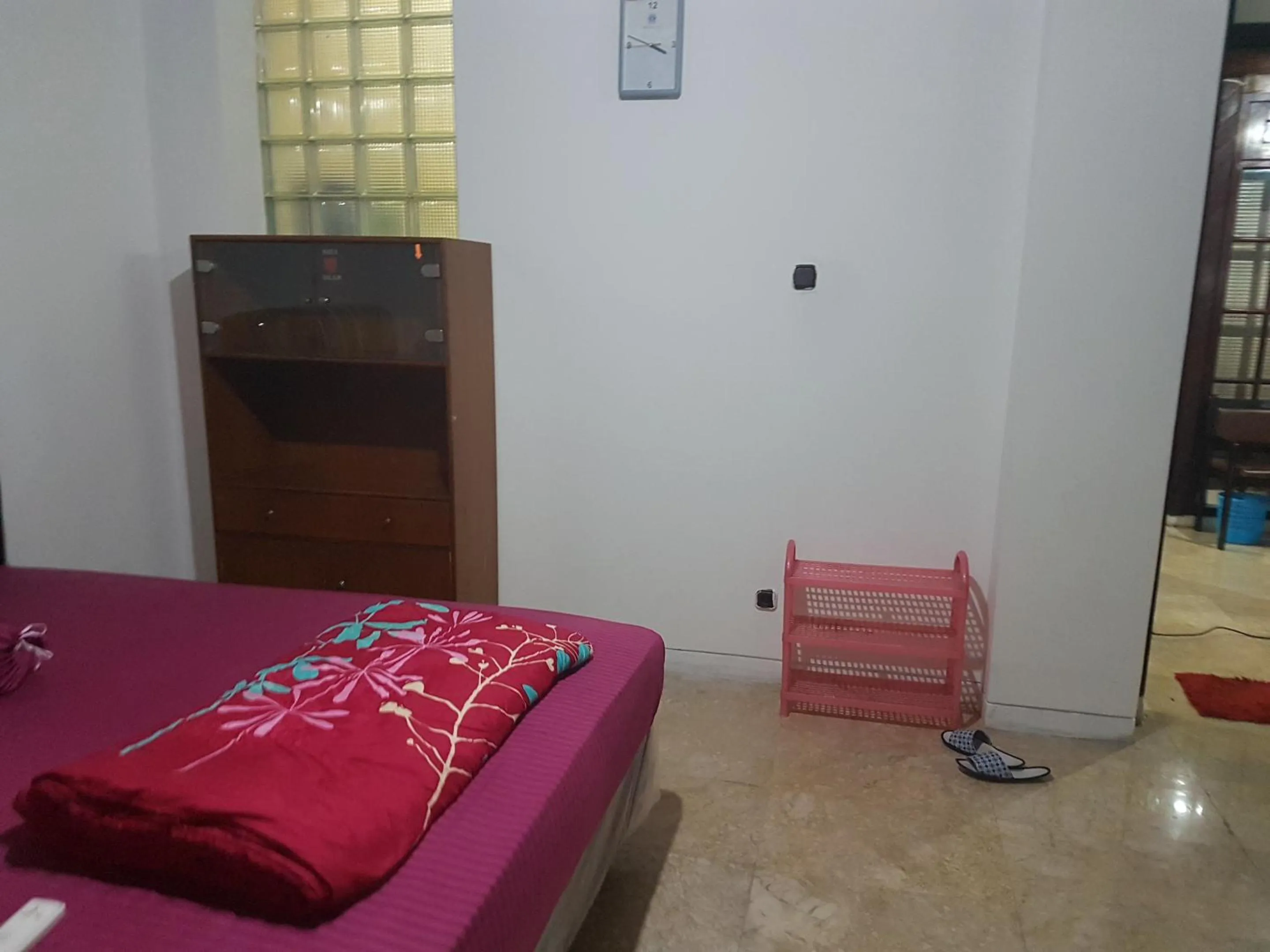 Bed in Mayestik Guest House Syariah