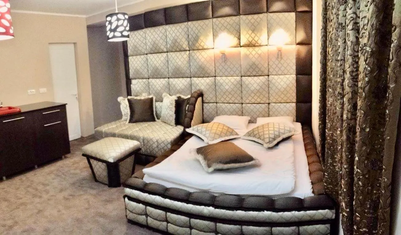 Bed in Bali Colosseum Hotel