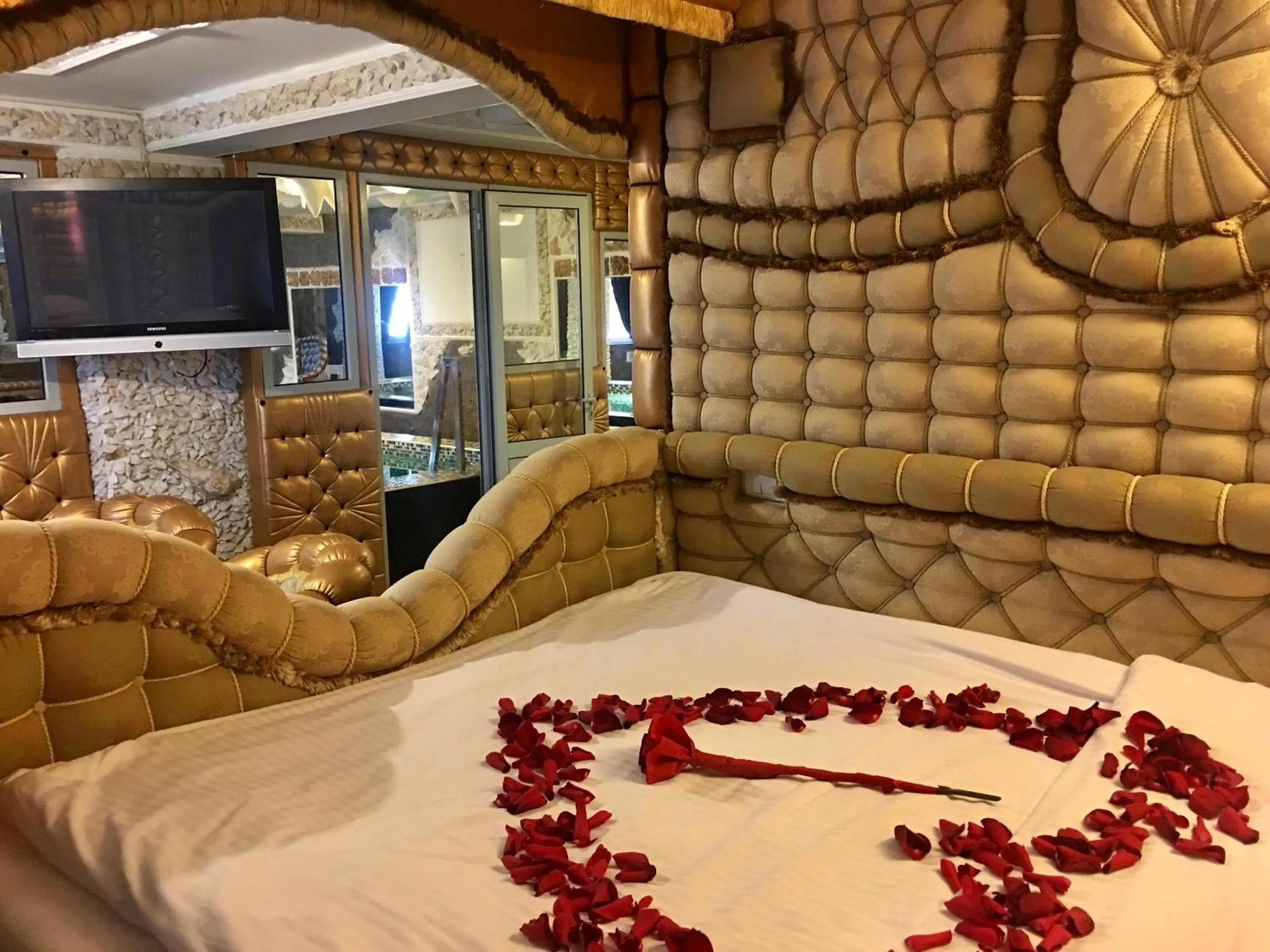 Bed in Bali Colosseum Hotel