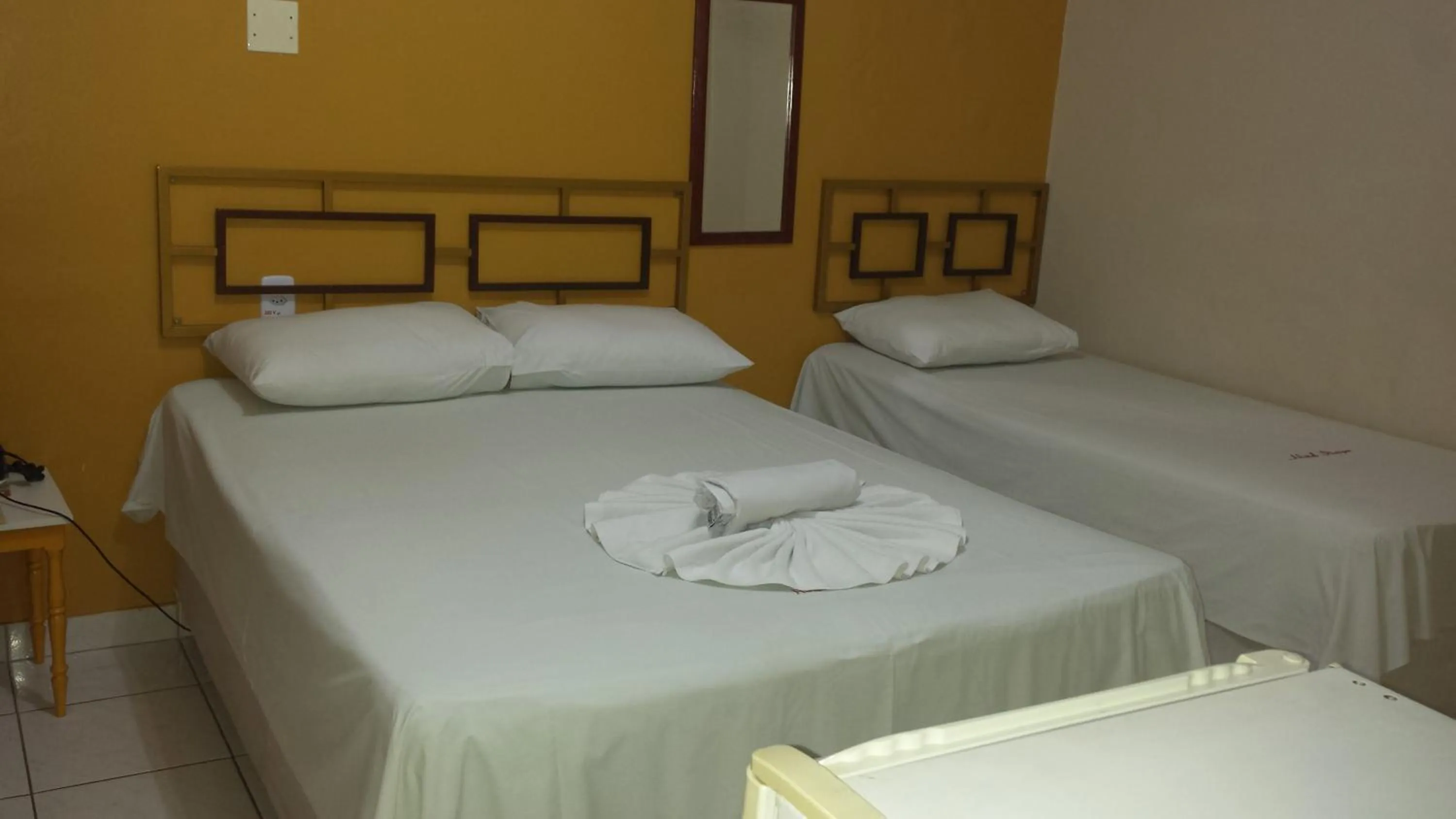 Bed in Hotel Itaipu