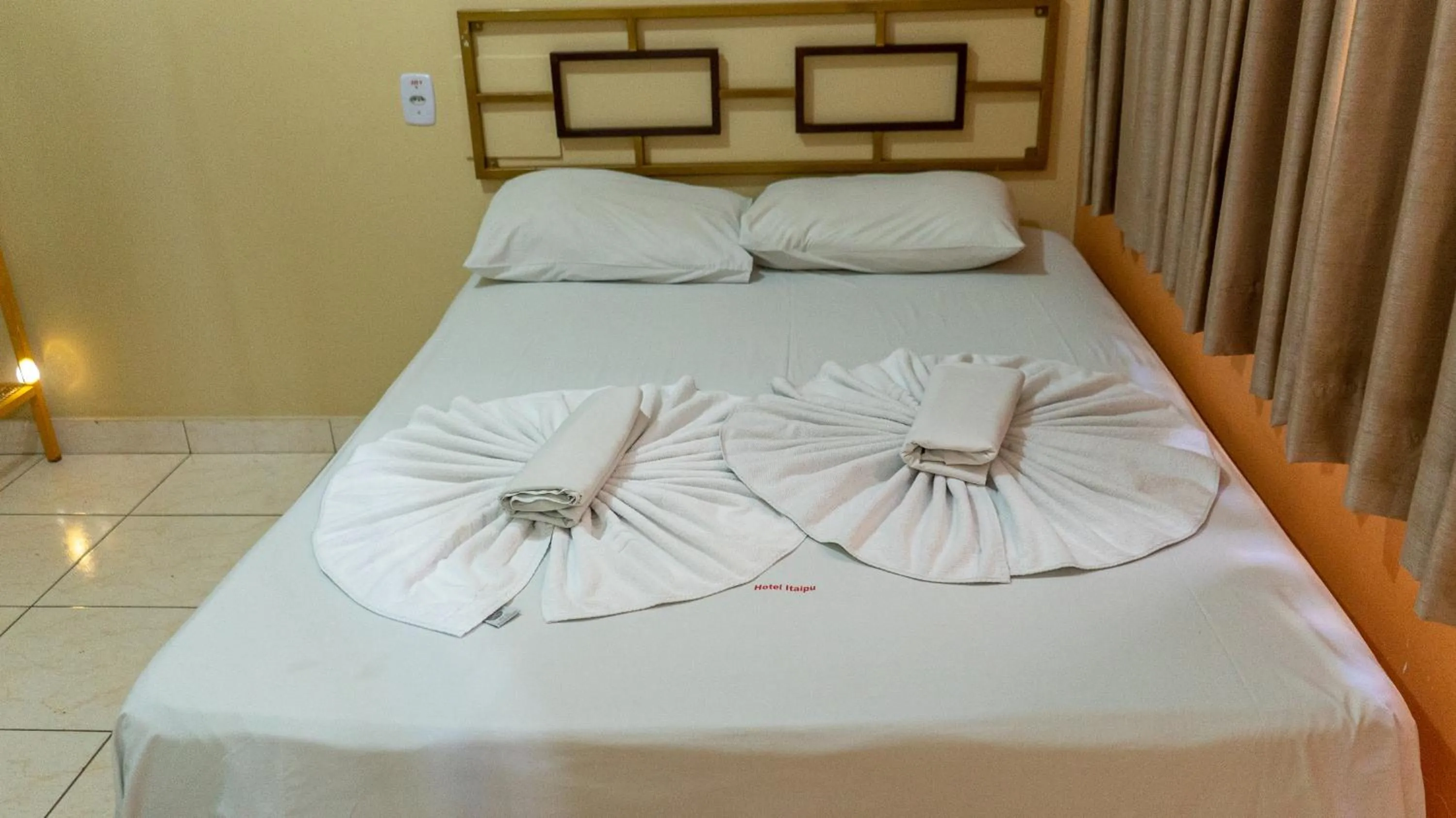 Bed in Hotel Itaipu