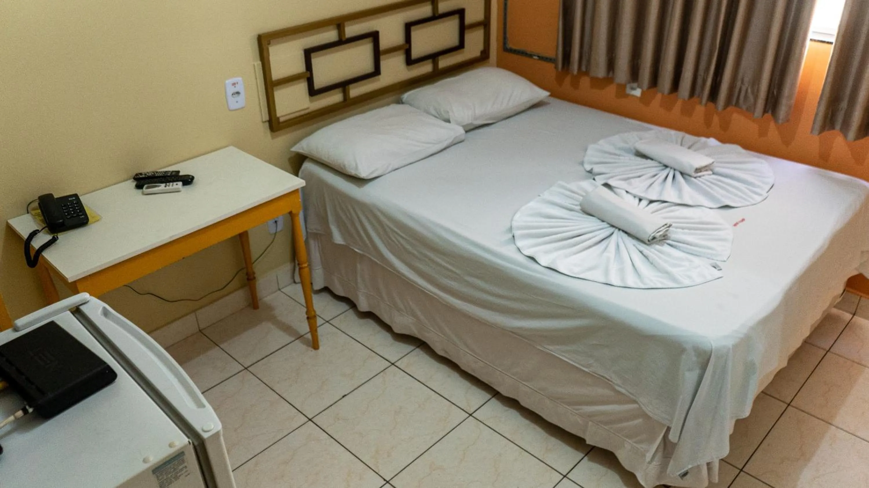 Bed in Hotel Itaipu