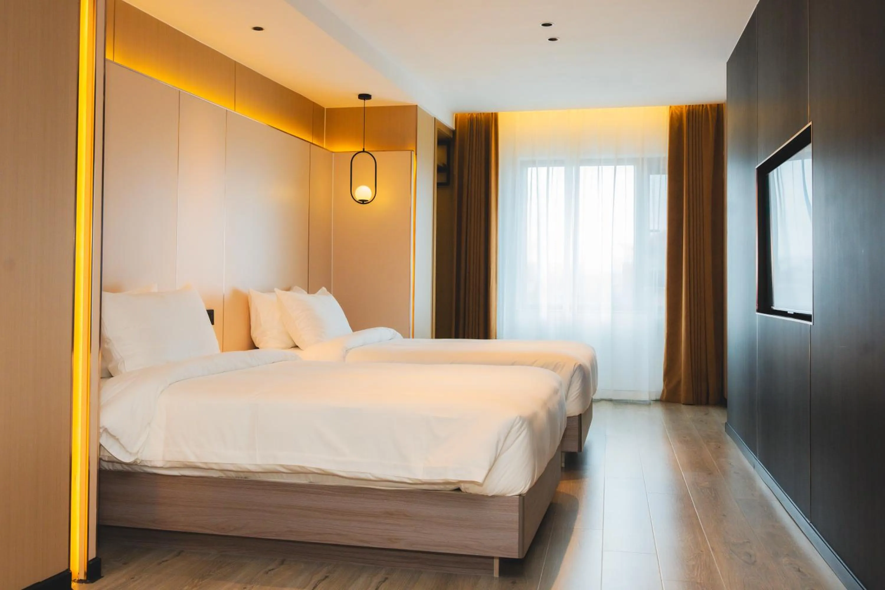 TV and multimedia, Bed in Jiuding Joy Hotel