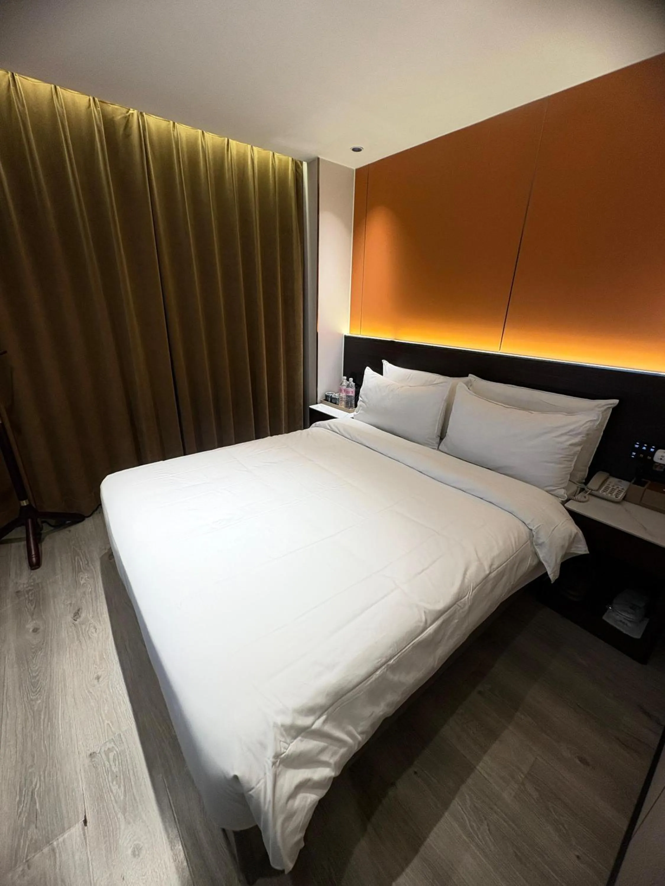 Bed in Jiuding Joy Hotel