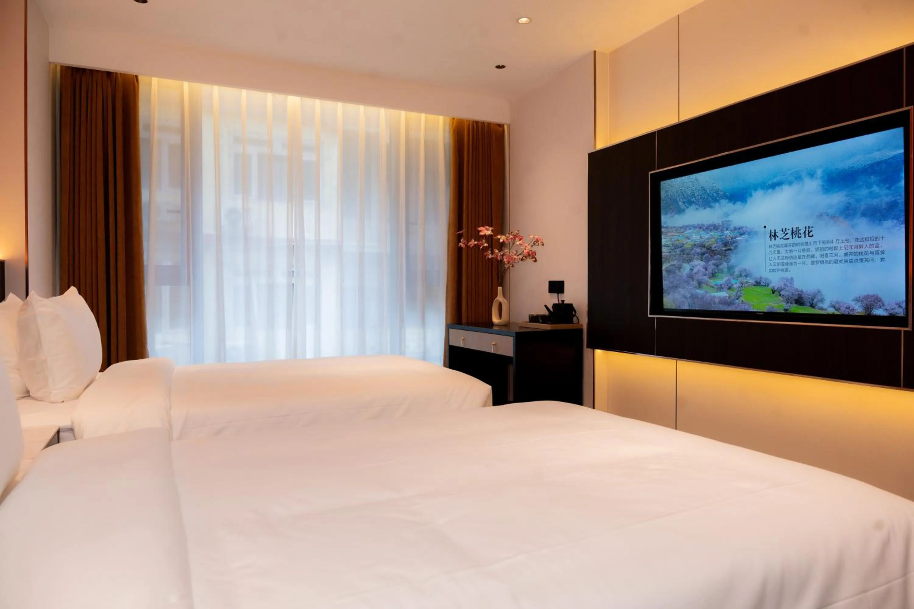 Bed in Jiuding Joy Hotel