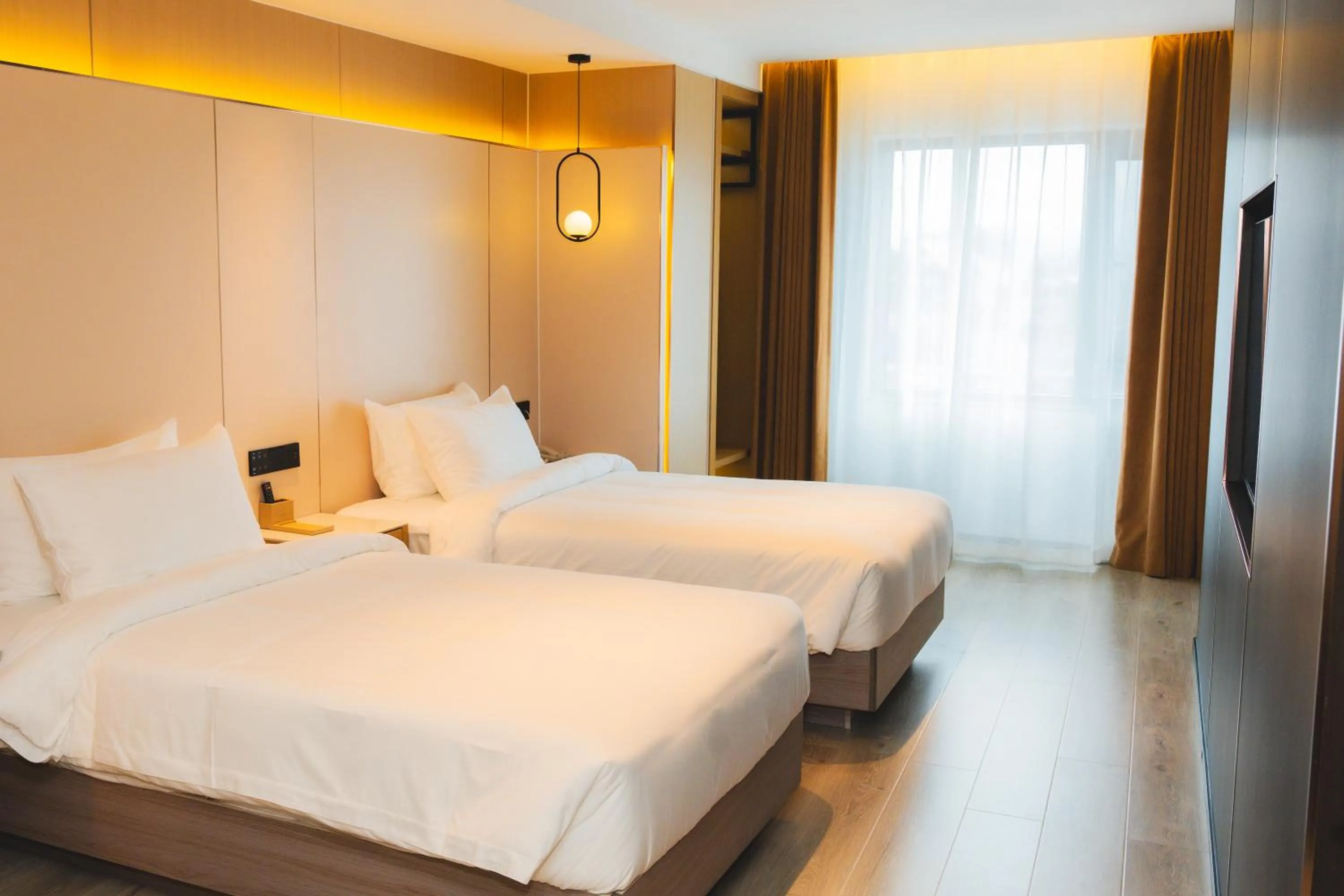 Bed in Jiuding Joy Hotel