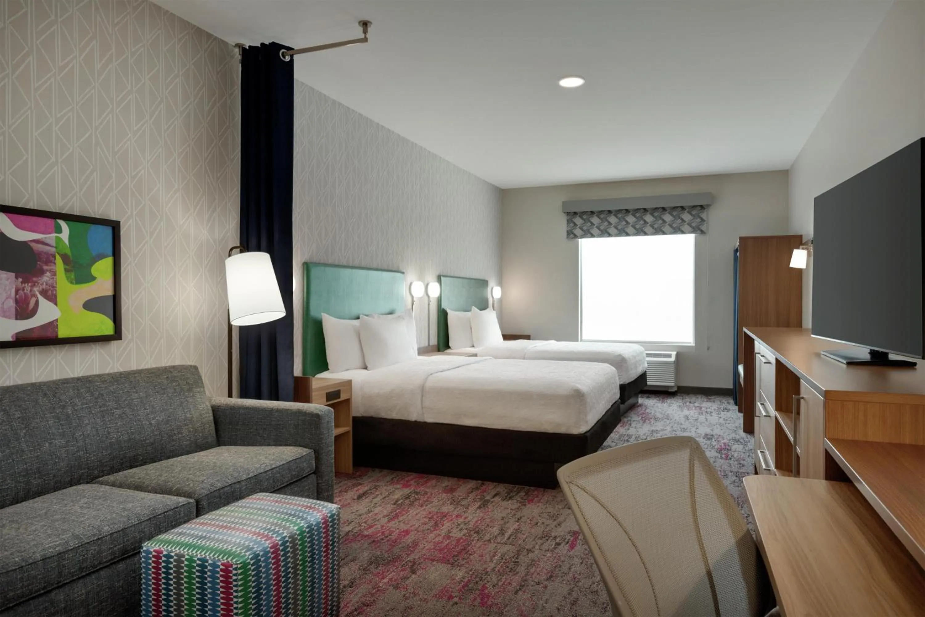 Living room, Bed in Home2 Suites By Hilton Denton