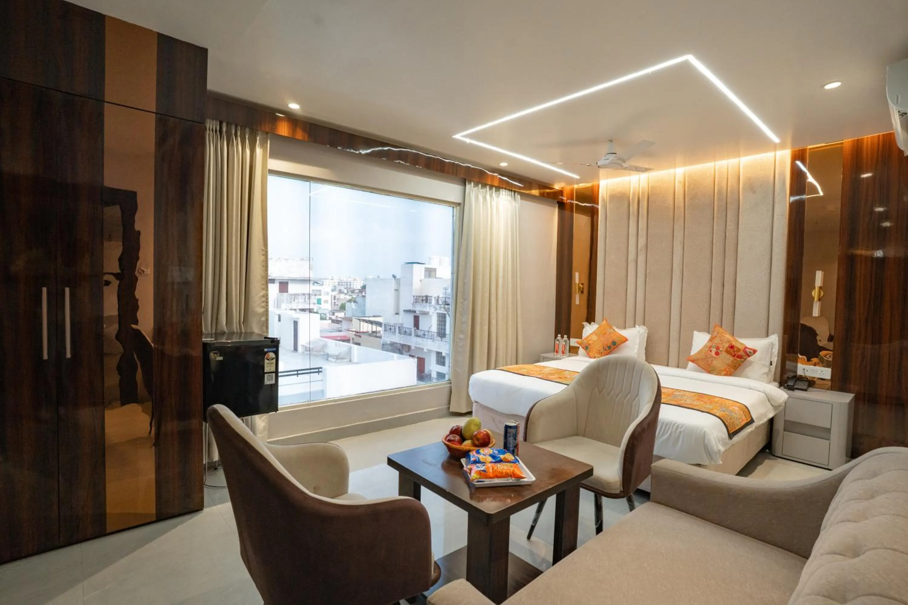 Bed in Tripli Hotels Evara Inn