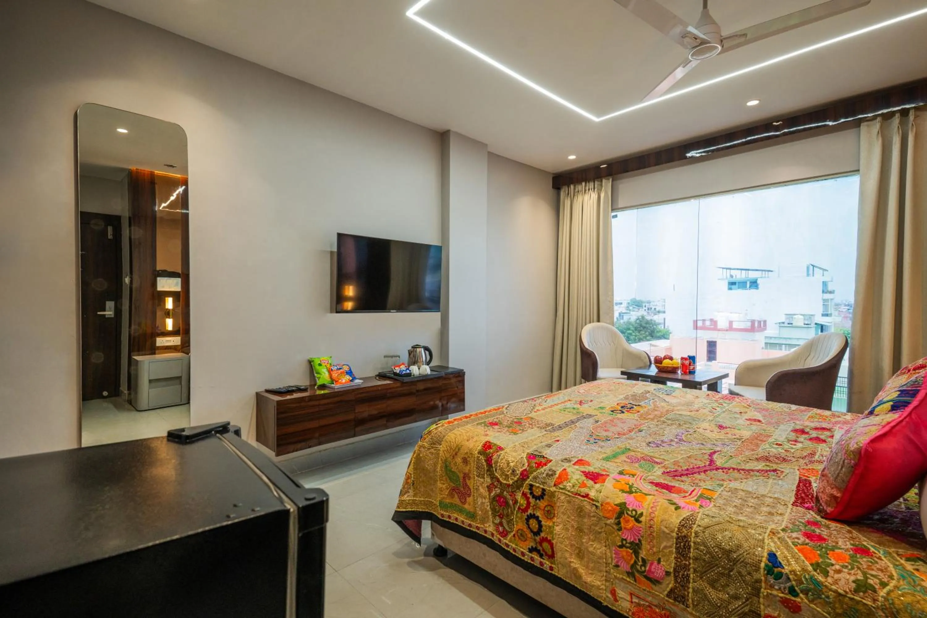 Bed in Tripli Hotels Evara Inn