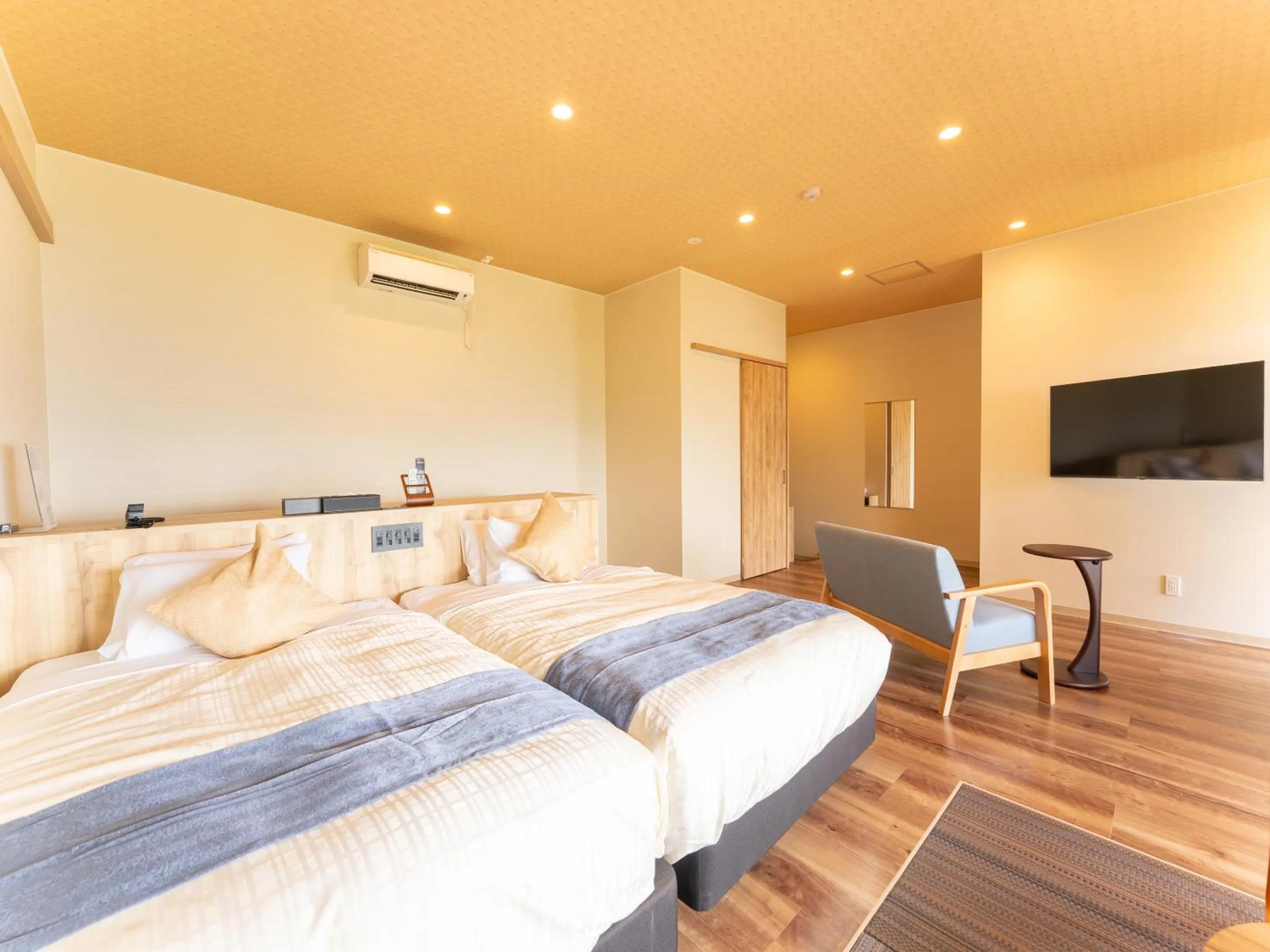 Bed in Livemax Resort Inami Seafront