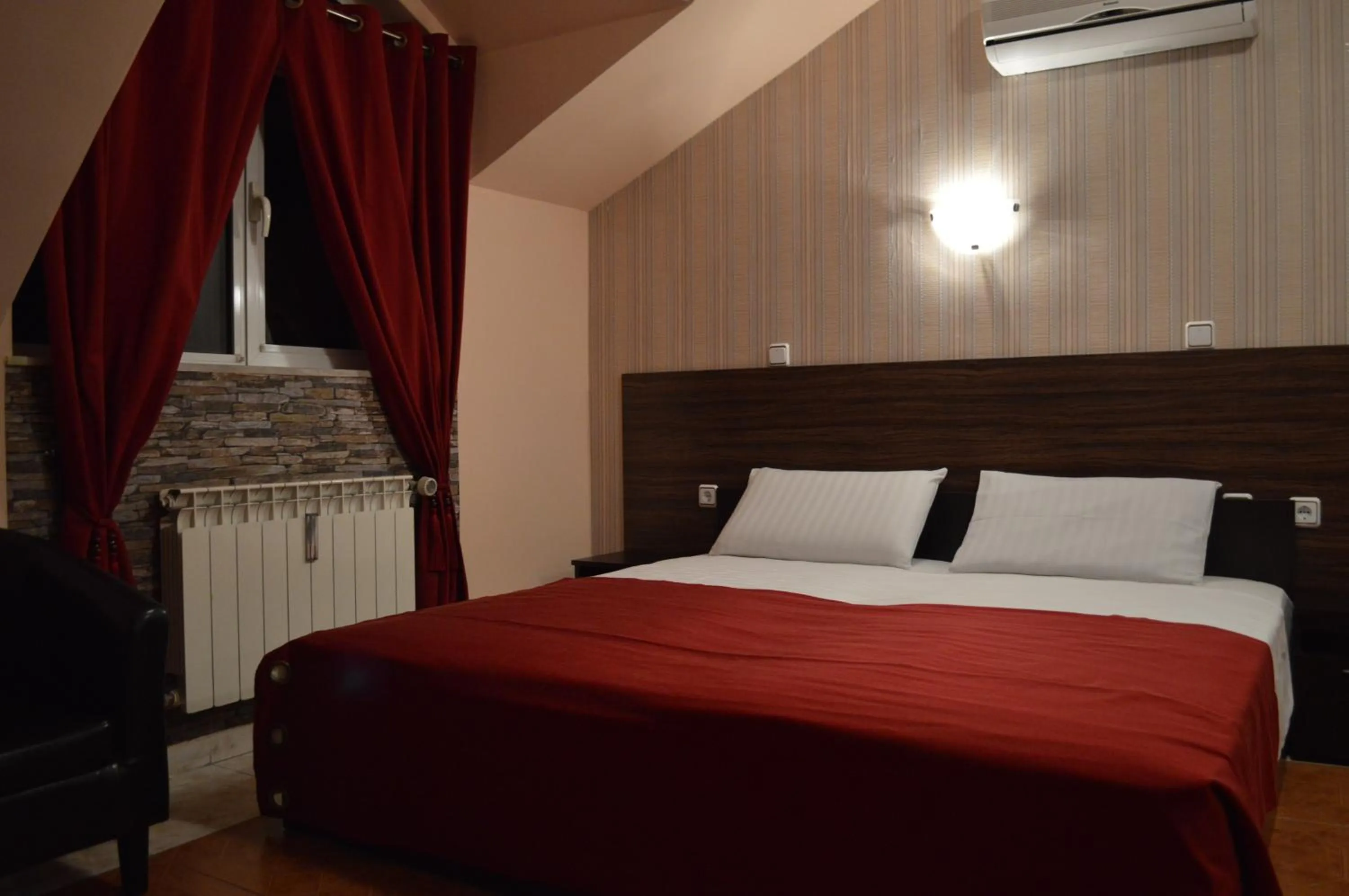 Bedroom in Bon Bon Hotel