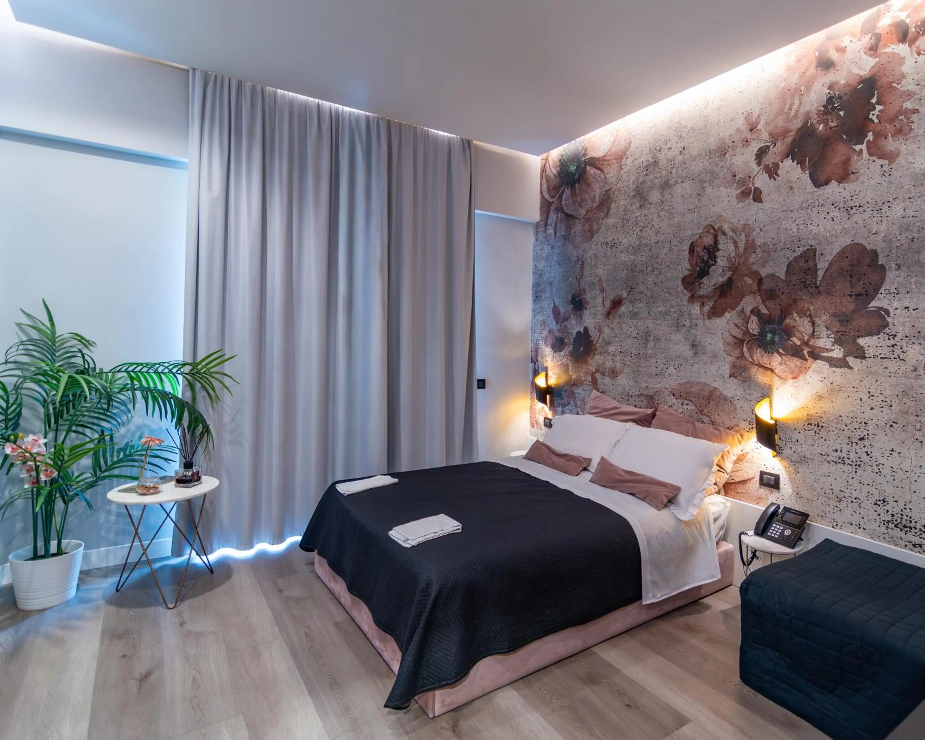 Bed in VESUVIANUS Rooms and More