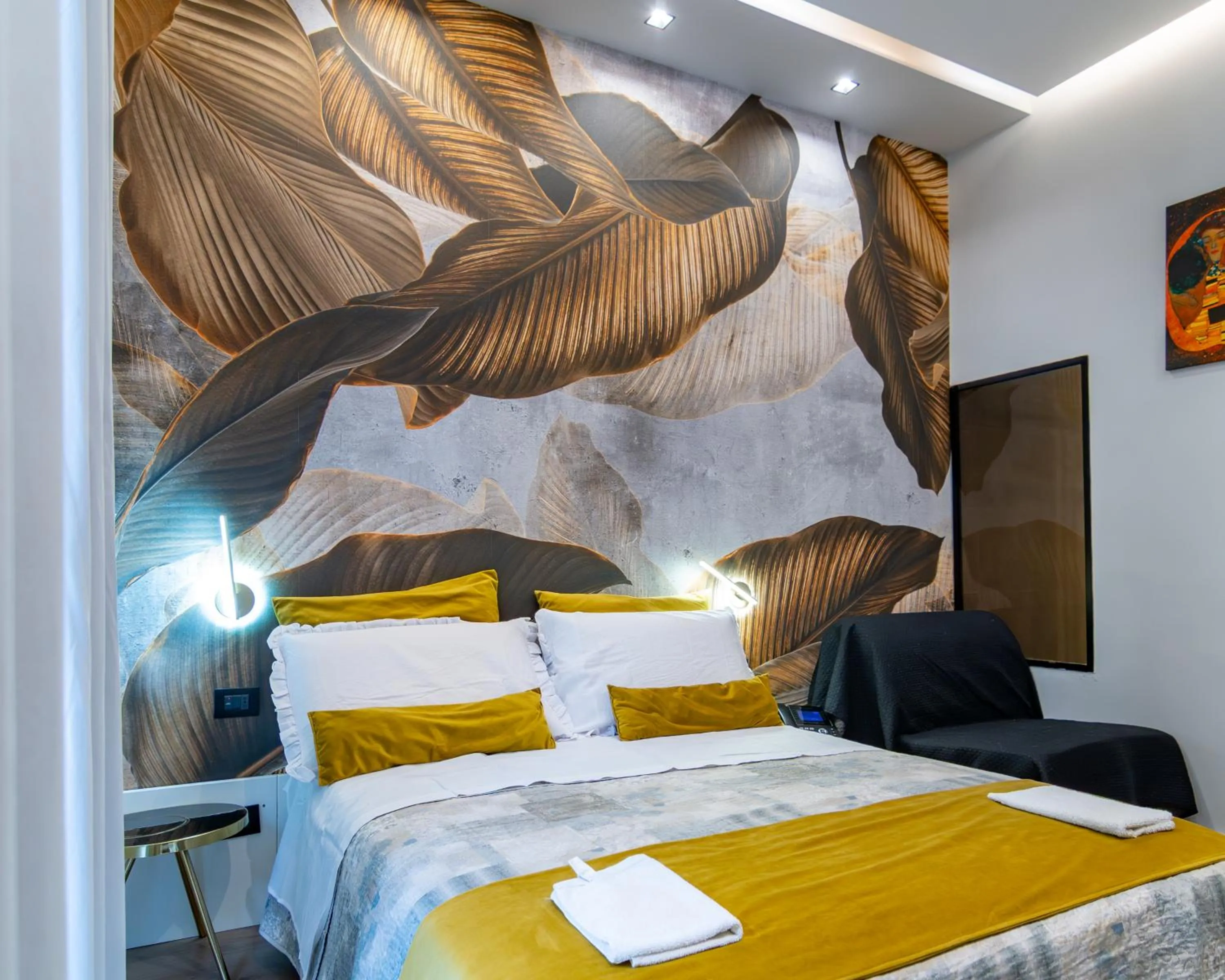 Bed in VESUVIANUS Rooms and More