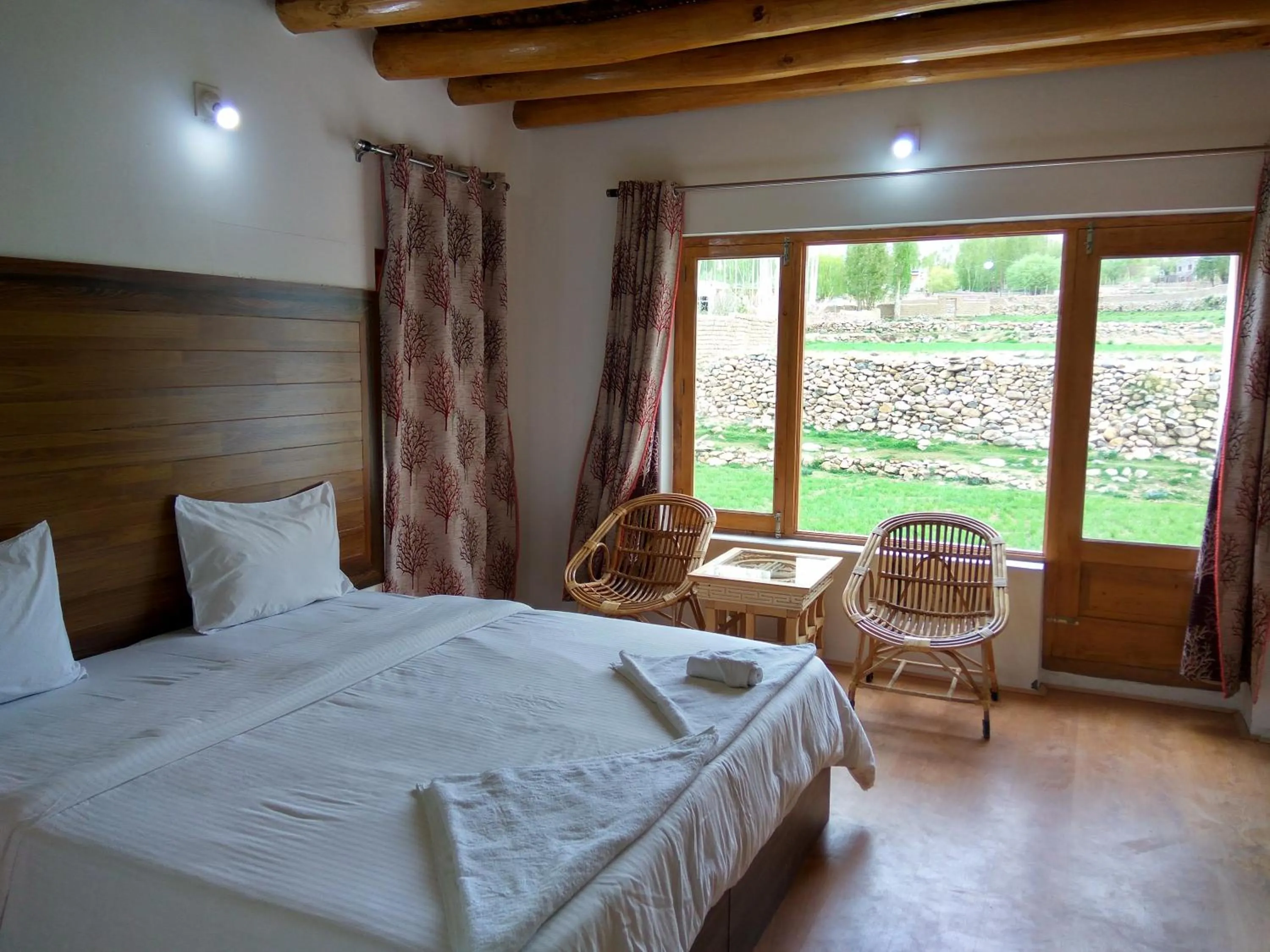 Photo of the whole room, Bed in Shaolin Ladakh