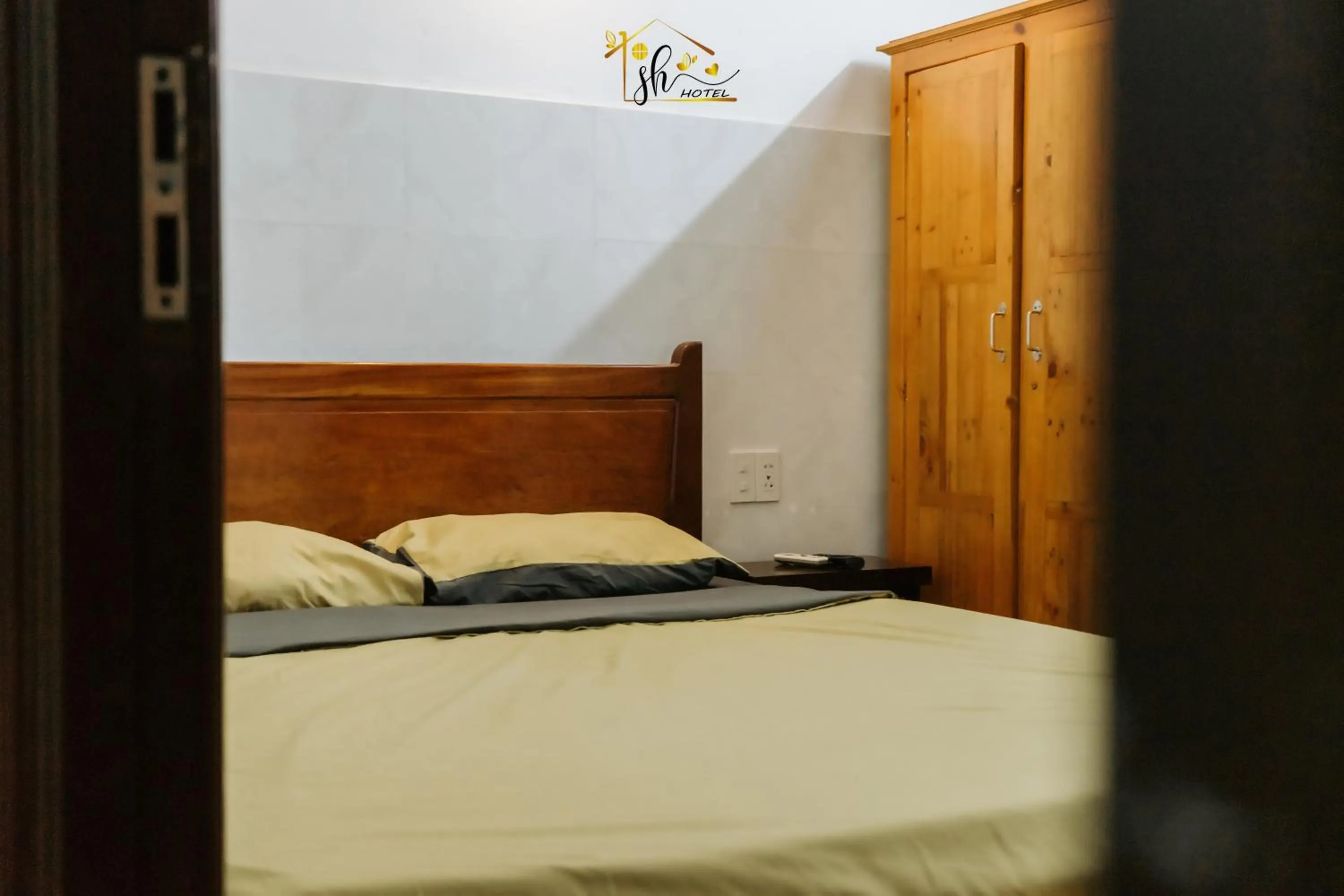 Bed in SH Hotel & Luggage storage