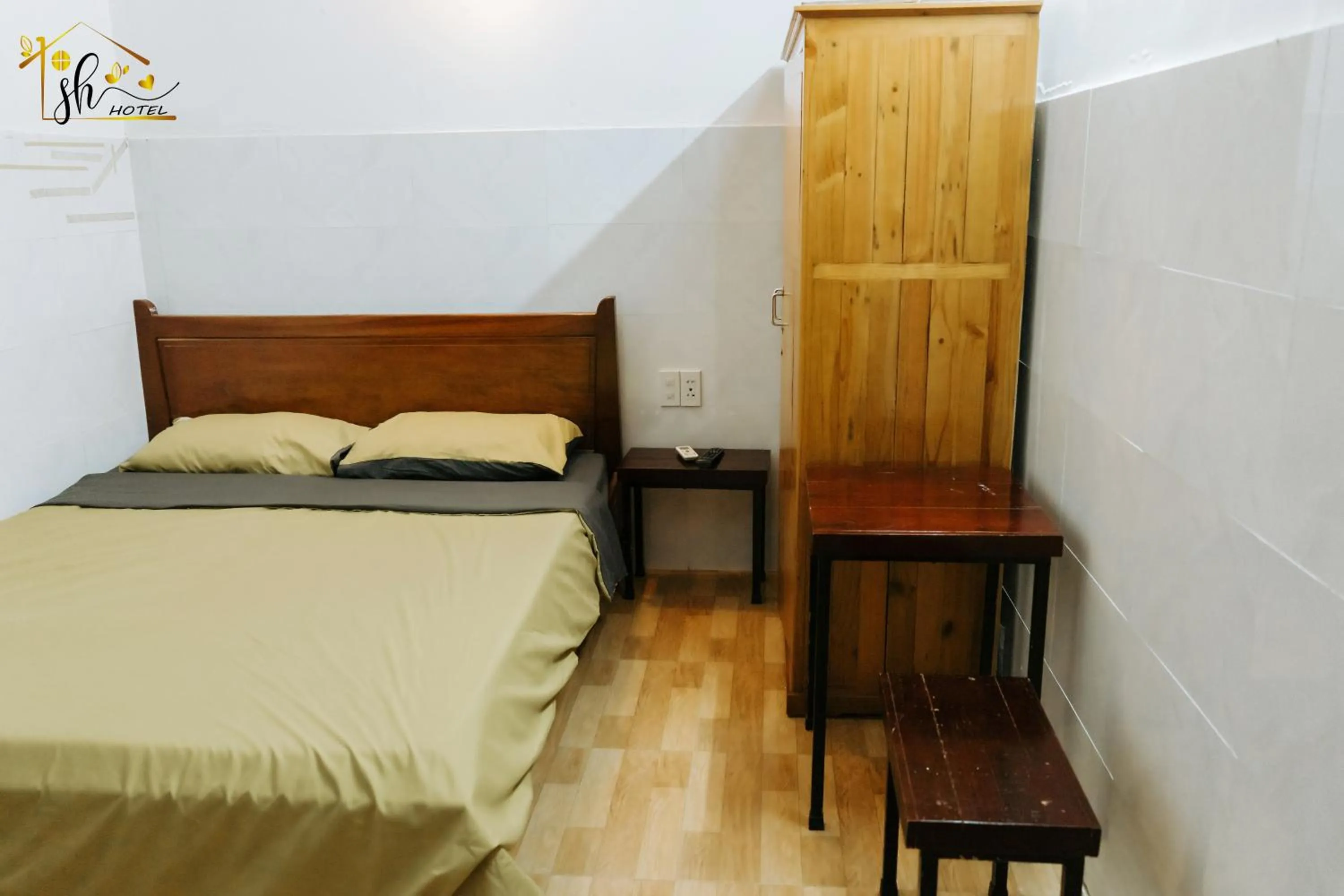 Bed in SH Hotel & Luggage storage