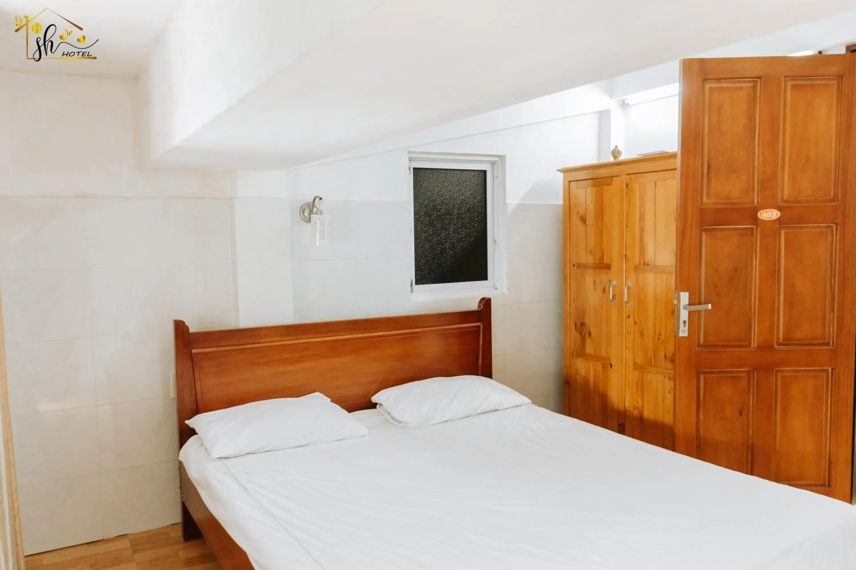 Bed in SH Hotel & Luggage storage