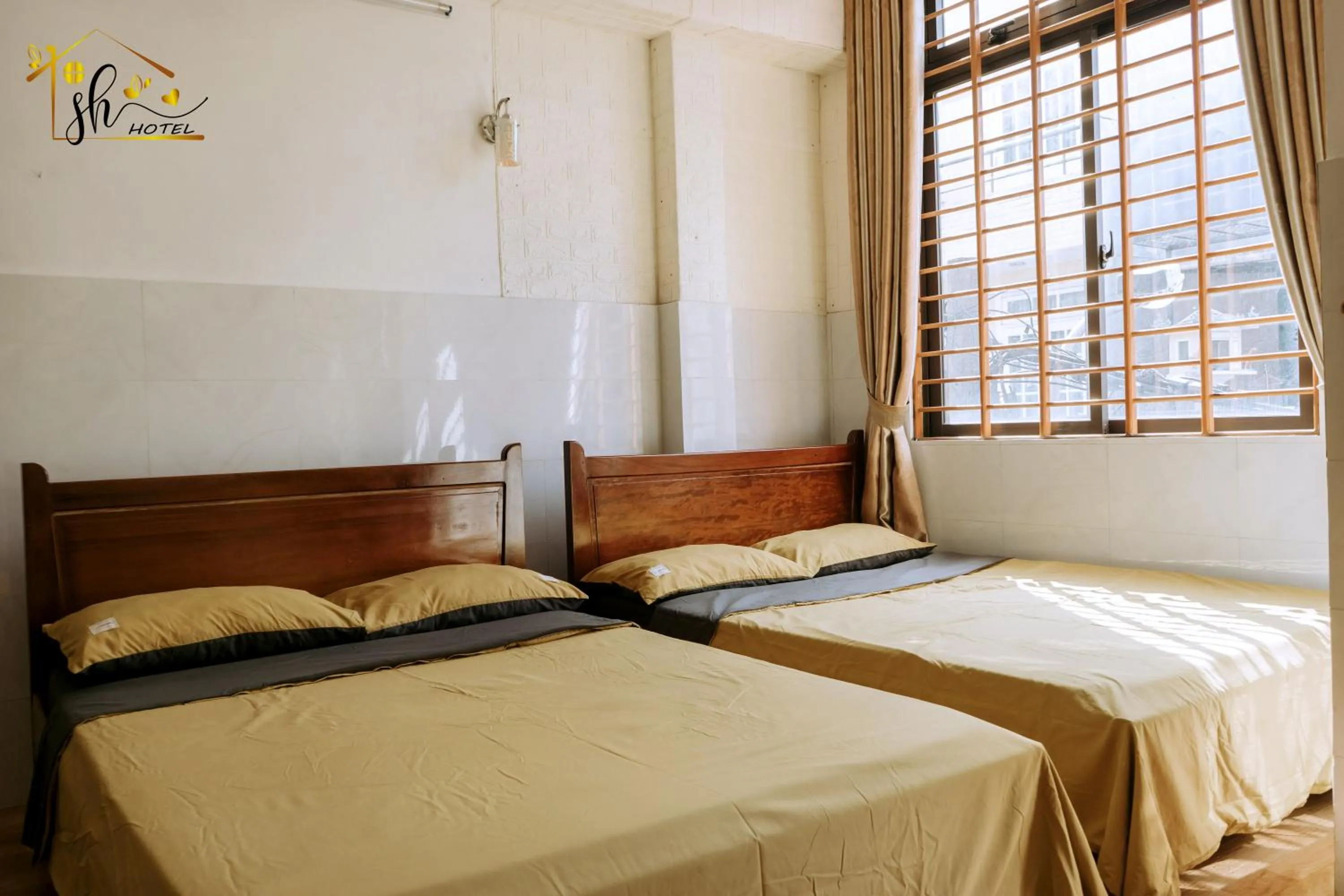 Photo of the whole room, Bed in SH Hotel & Luggage storage