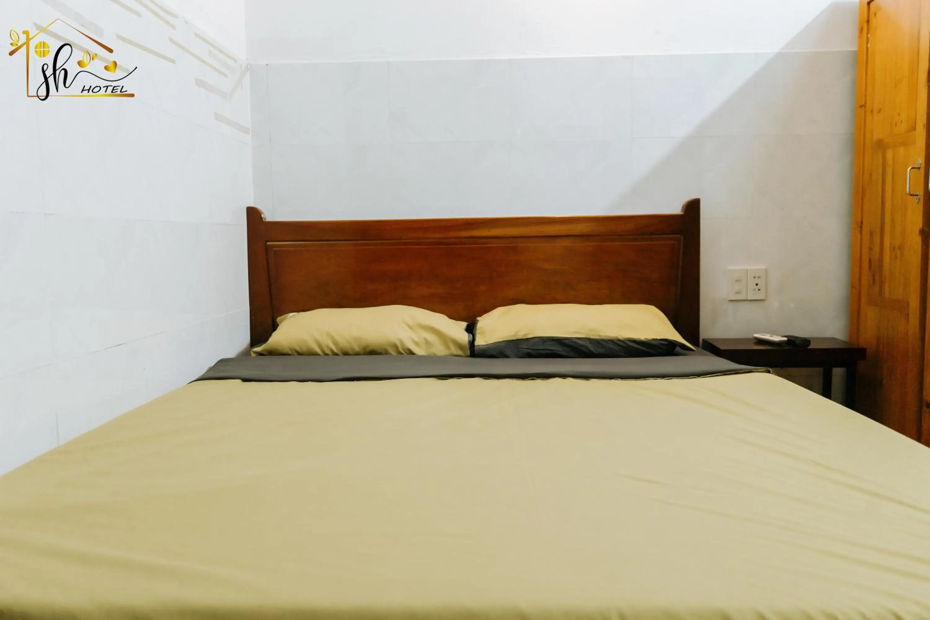 Bed in SH Hotel & Luggage storage