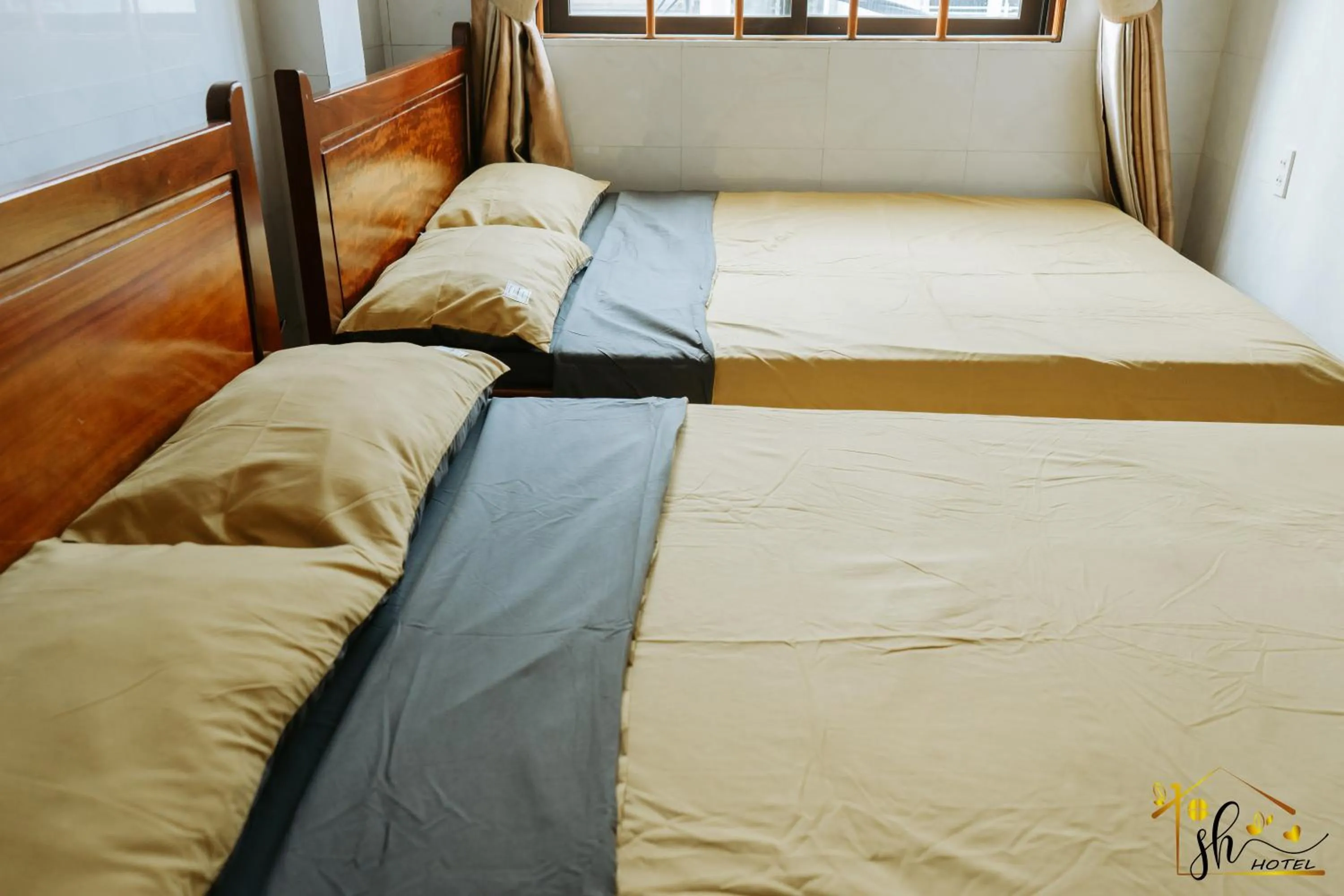 Bed in SH Hotel & Luggage storage