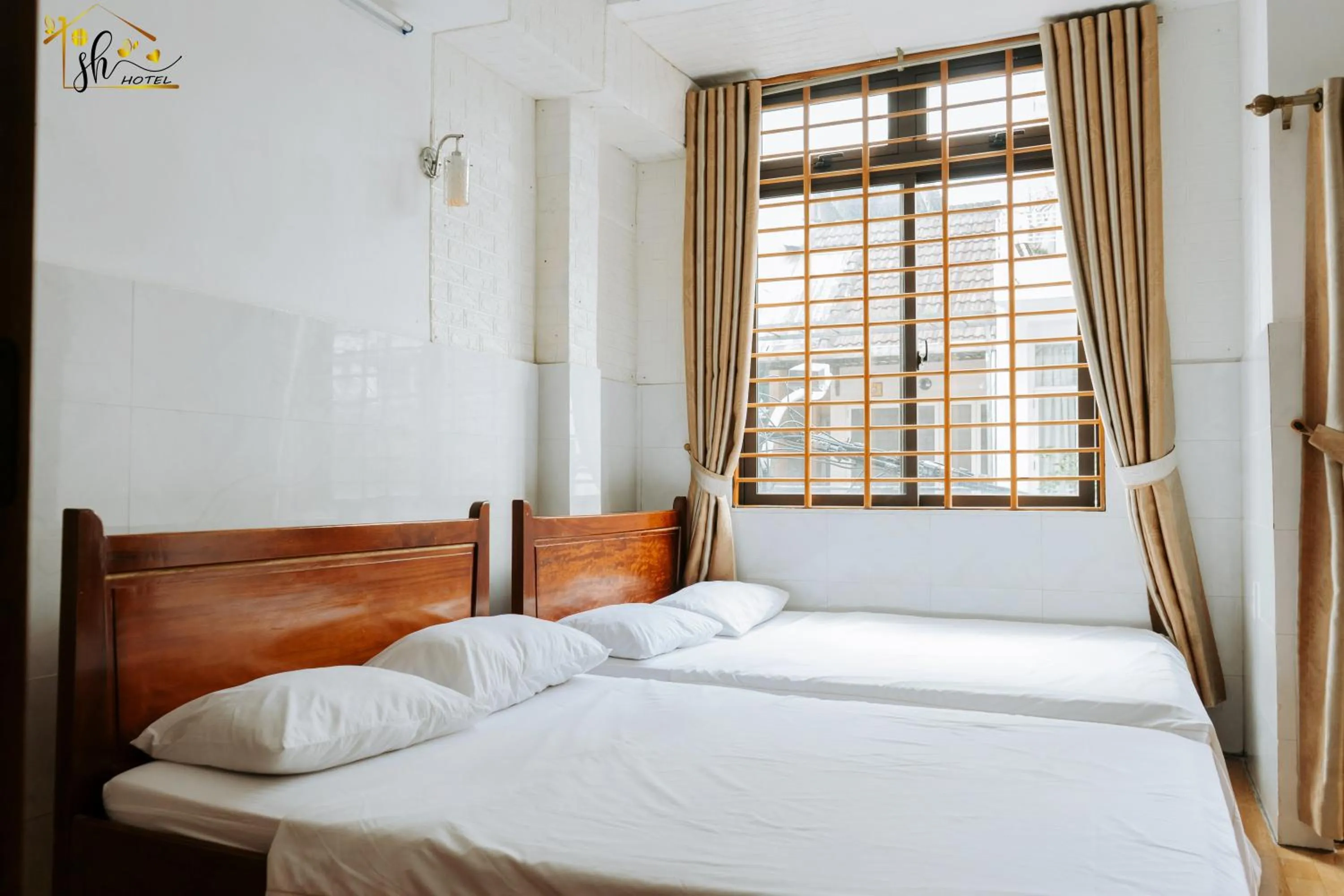 Photo of the whole room, Bed in SH Hotel & Luggage storage