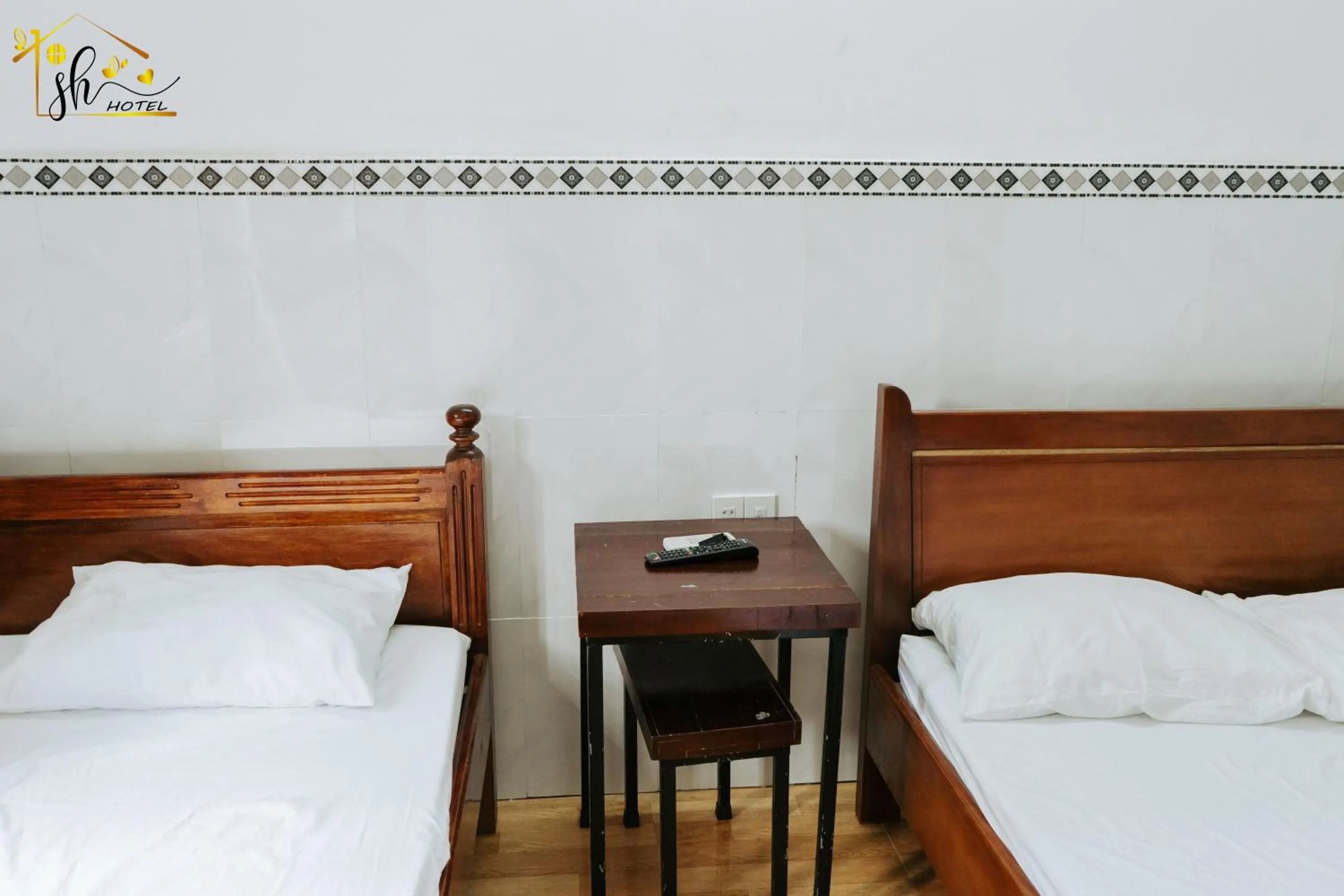 Bed in SH Hotel & Luggage storage