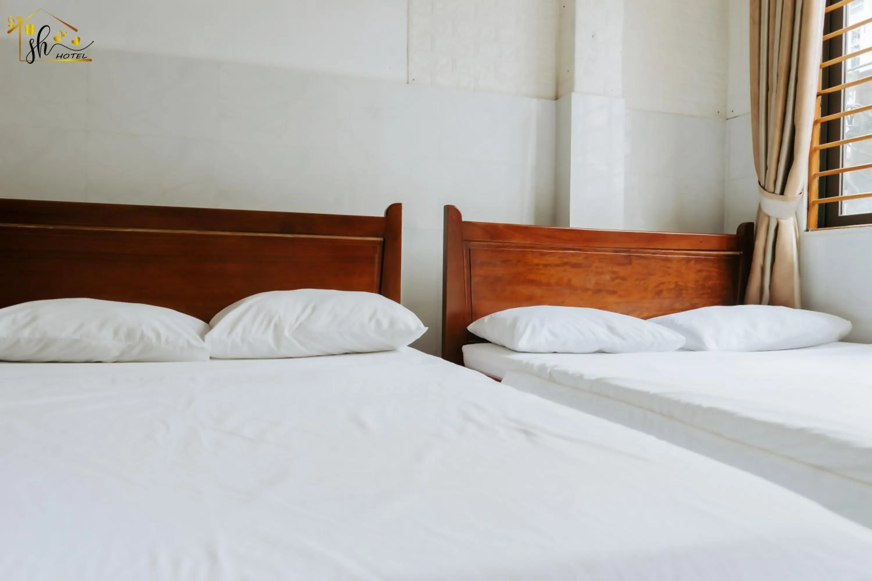 Bed in SH Hotel & Luggage storage