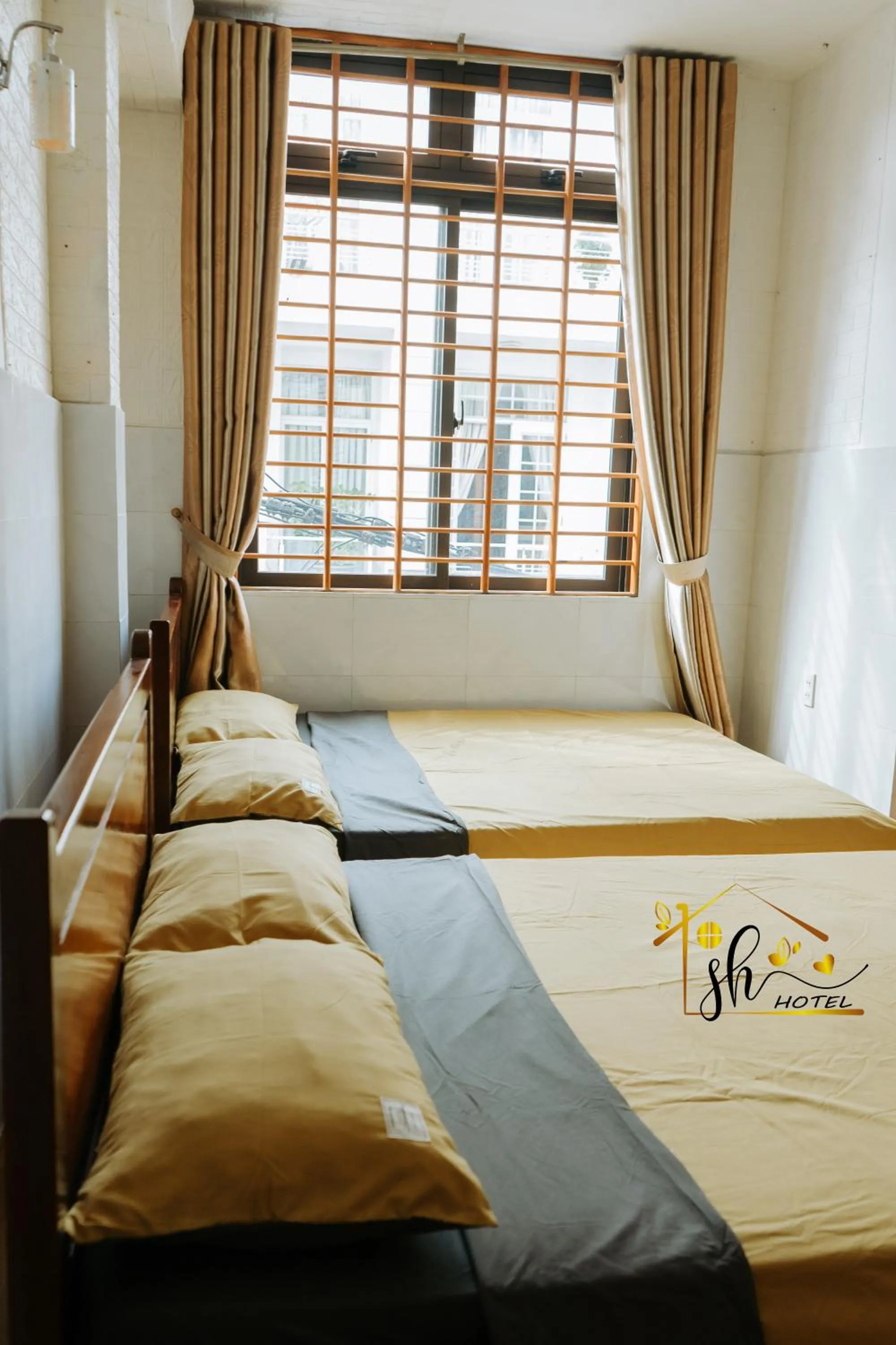 Bed in SH Hotel & Luggage storage