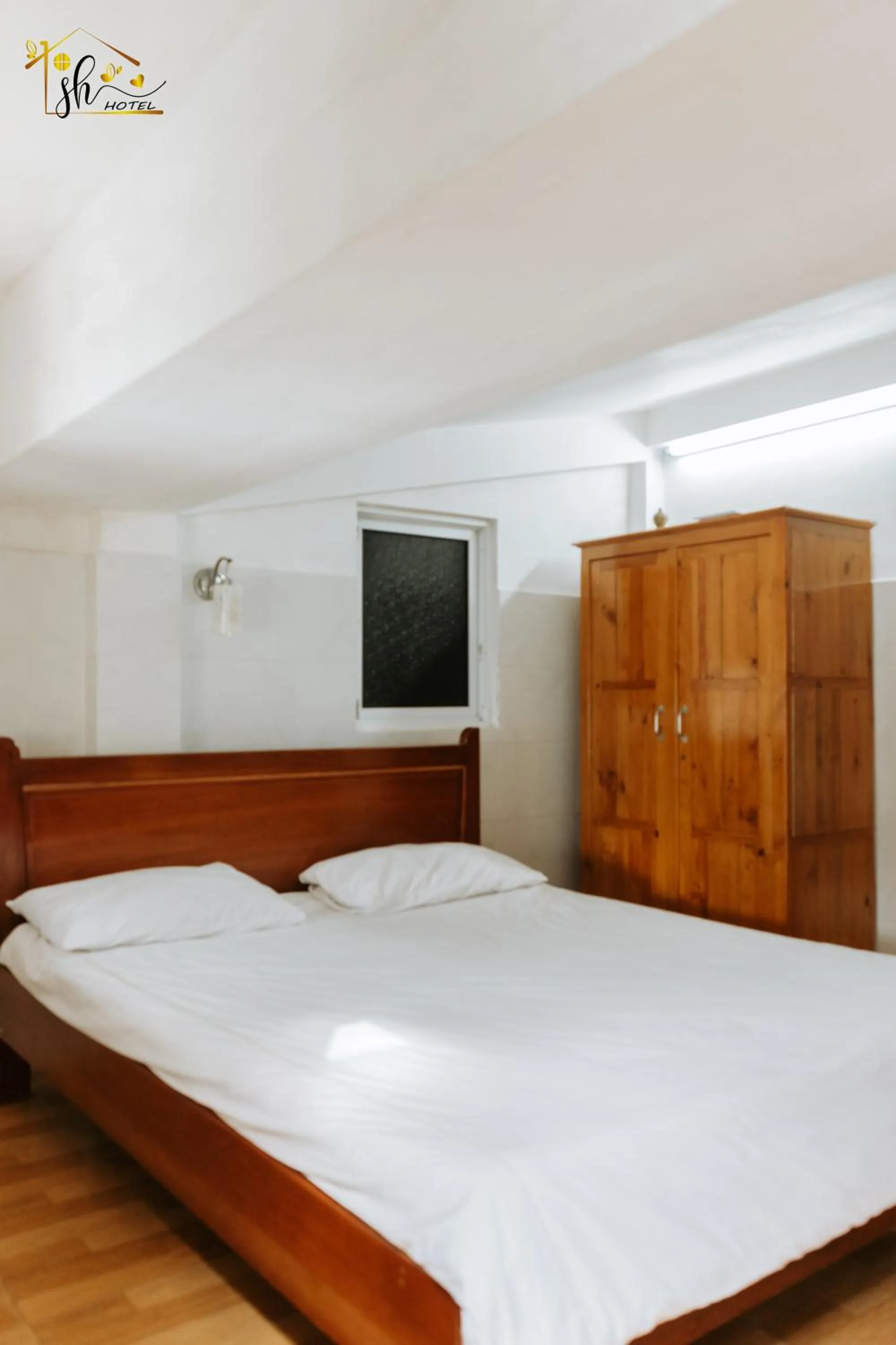 Bed in SH Hotel & Luggage storage