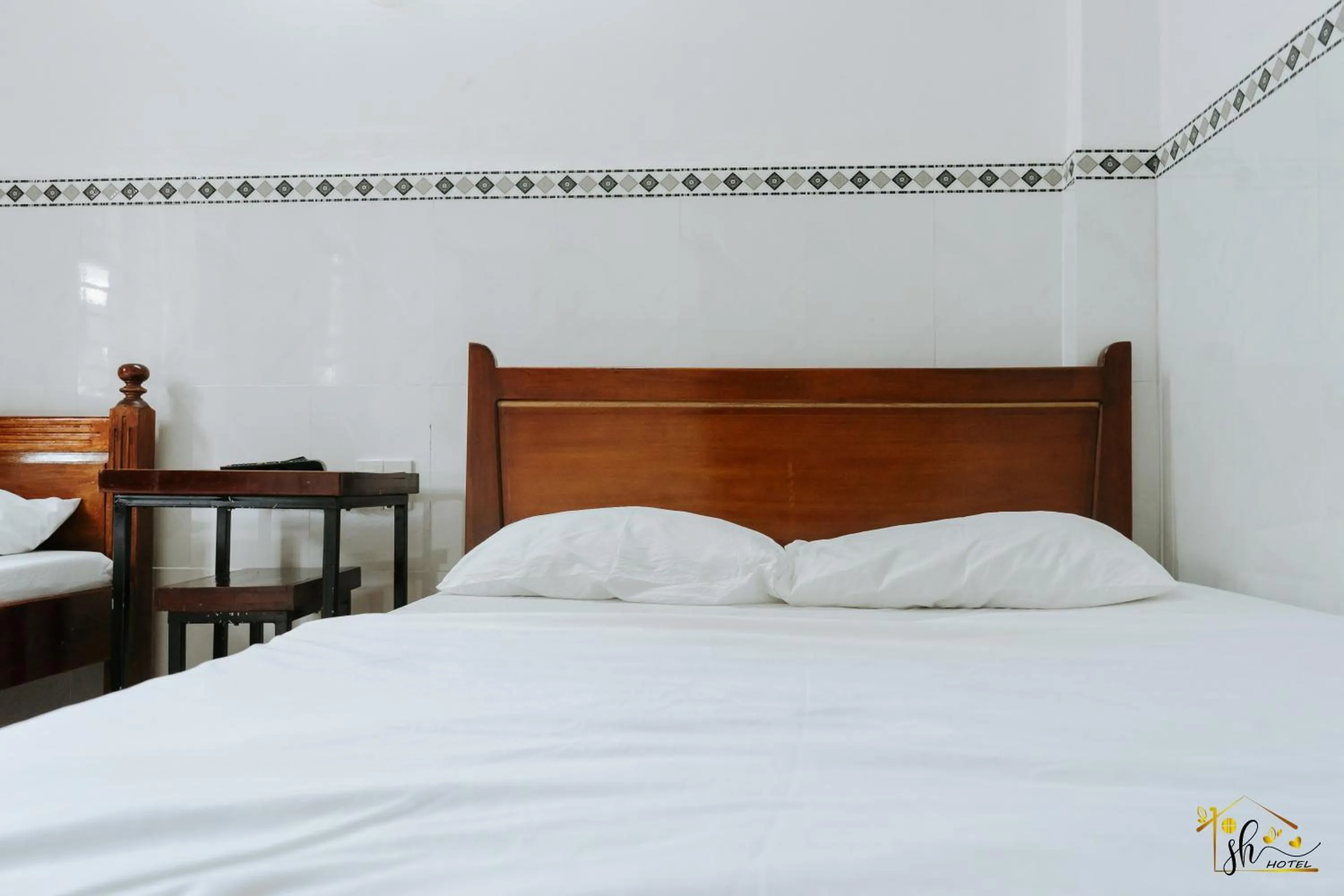 Bed in SH Hotel & Luggage storage