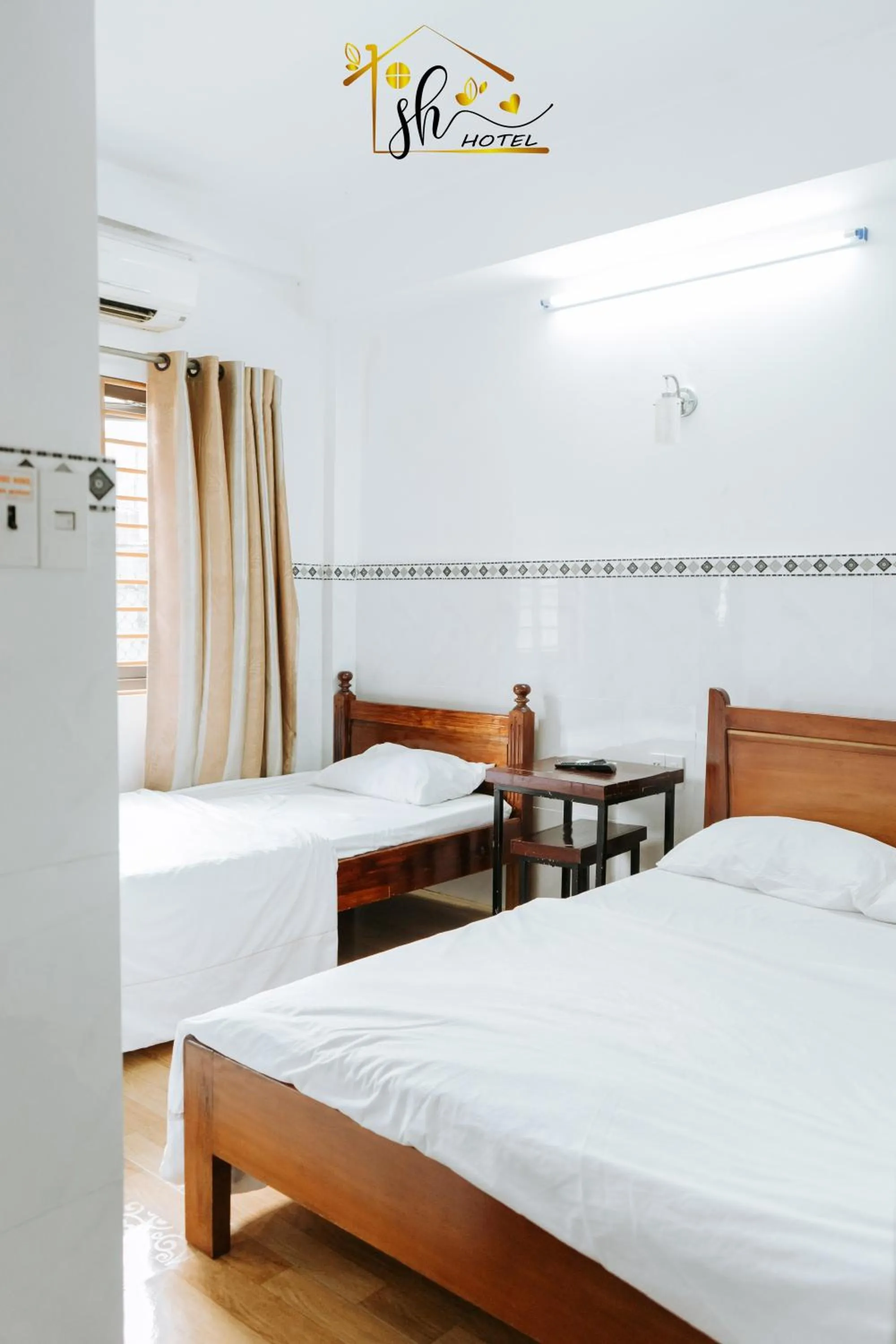 Photo of the whole room, Bed in SH Hotel & Luggage storage